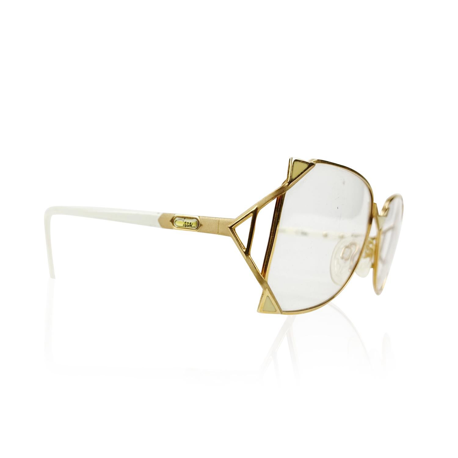 Rare, Vintage Eyeglasses by CAZAL Mod. 236, from the 80s. Made in West Germany. Gold metal frame. with white triangle detailng. Clear / transparent DEMO lens, with CAZAL signature. Model refs: Mod. 236 - Col. 97/08 - 57/15 -