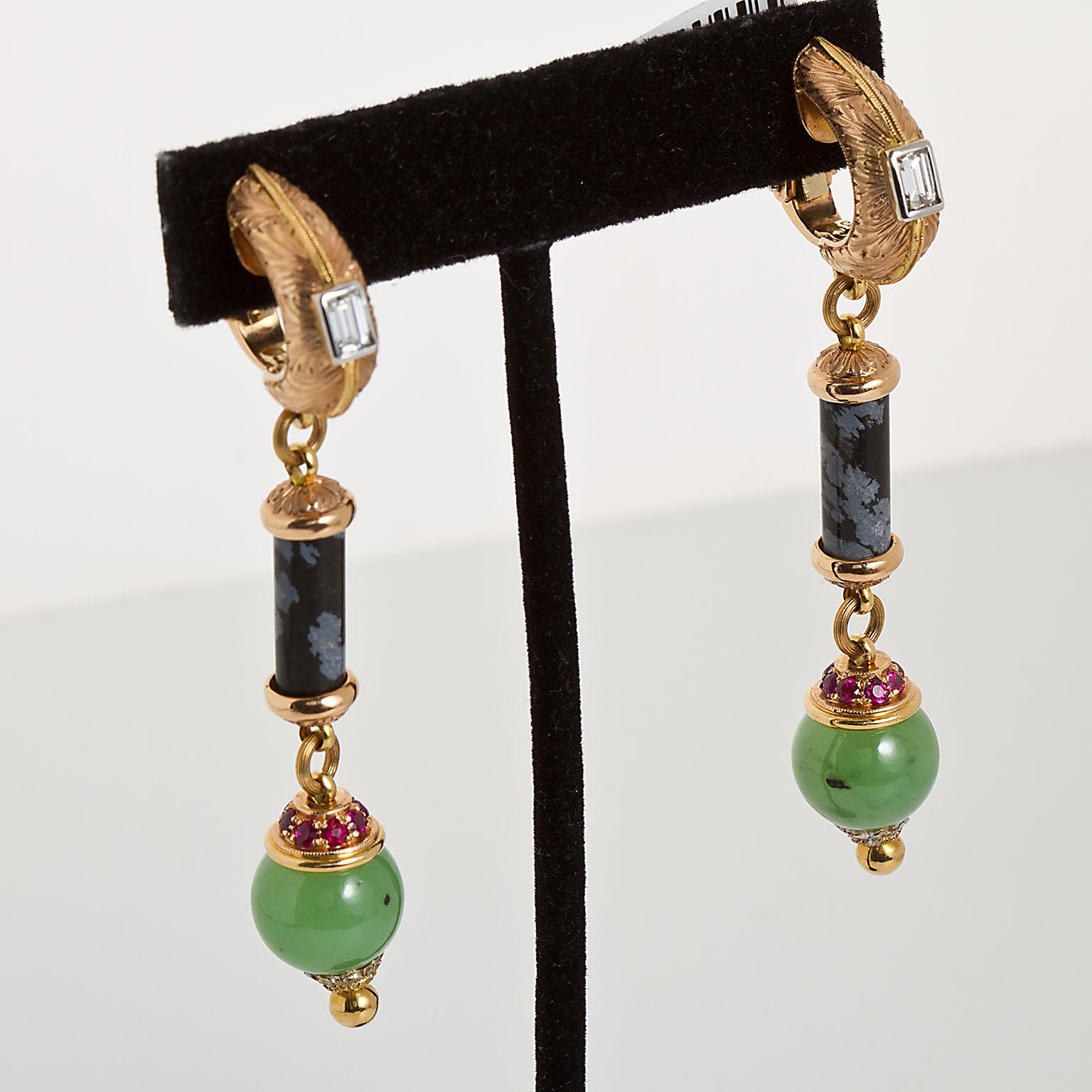 A remarkable pair of dangle earrings created by the master Angelo Giorgio Cazzaniga.    Intricately etched earrings set with two baguette cut diamonds with a black columnar onyx snow center and a pair of polished round nephrite bordered with round