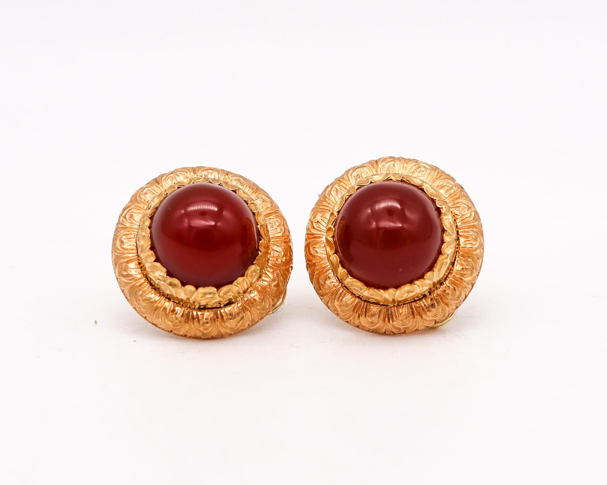 Pair of earrings designed by Cazzaniga.

An exceptional fine pair of earrings, created in Roma Italy by the jewelry house of Cazzaniga, back in the late 1970. This pair has been carefully crafted in round bombe shape, with intricate patterns of