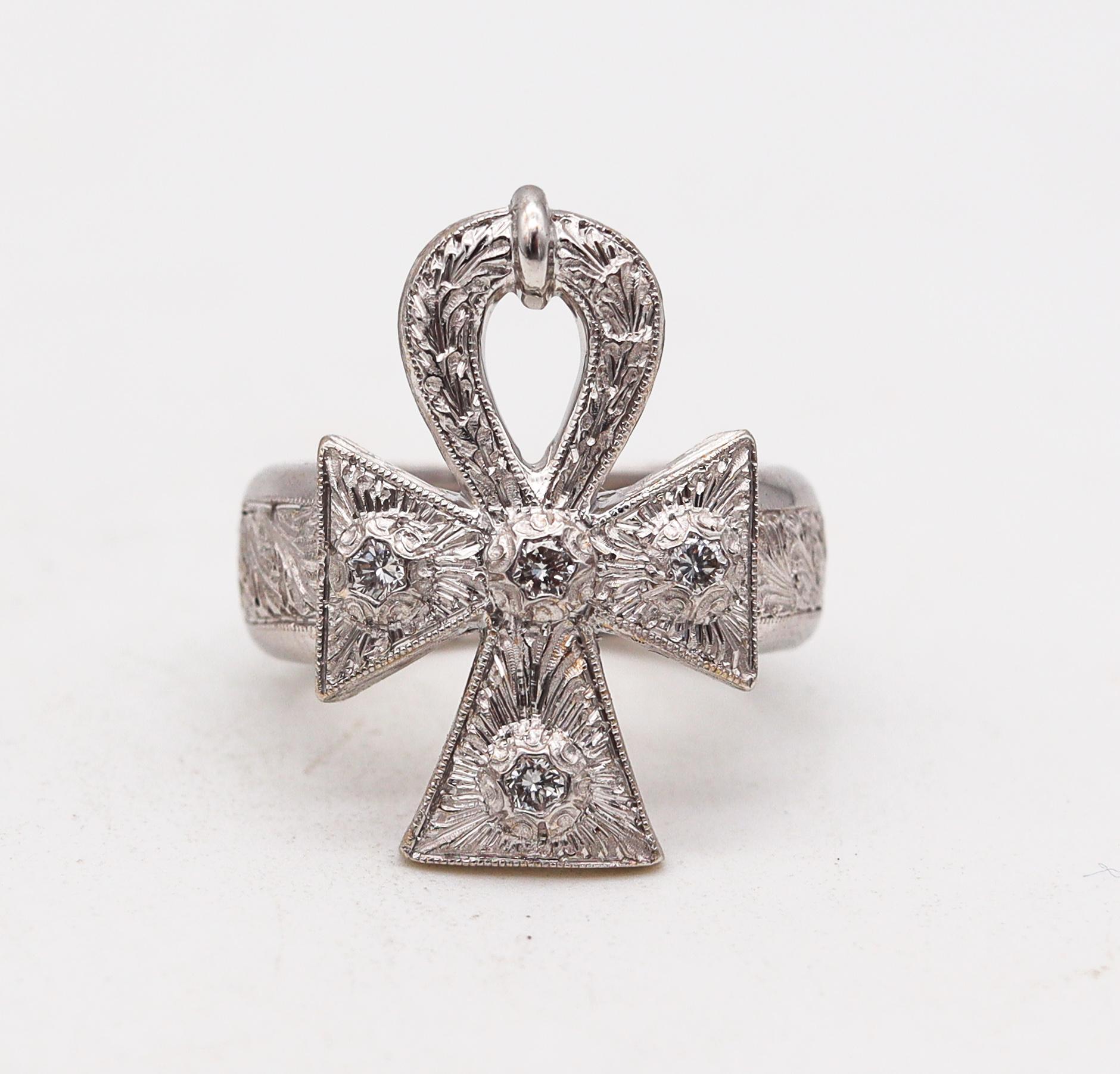Cocktail ring with Ankh designed by Cazzaniga.

Beautiful cocktail ring with Ankh cross motif, created in Roma Italy by the fine jewelry house of Cazzaniga. This intricate piece have been crafted with baroque revival patterns in solid white gold of