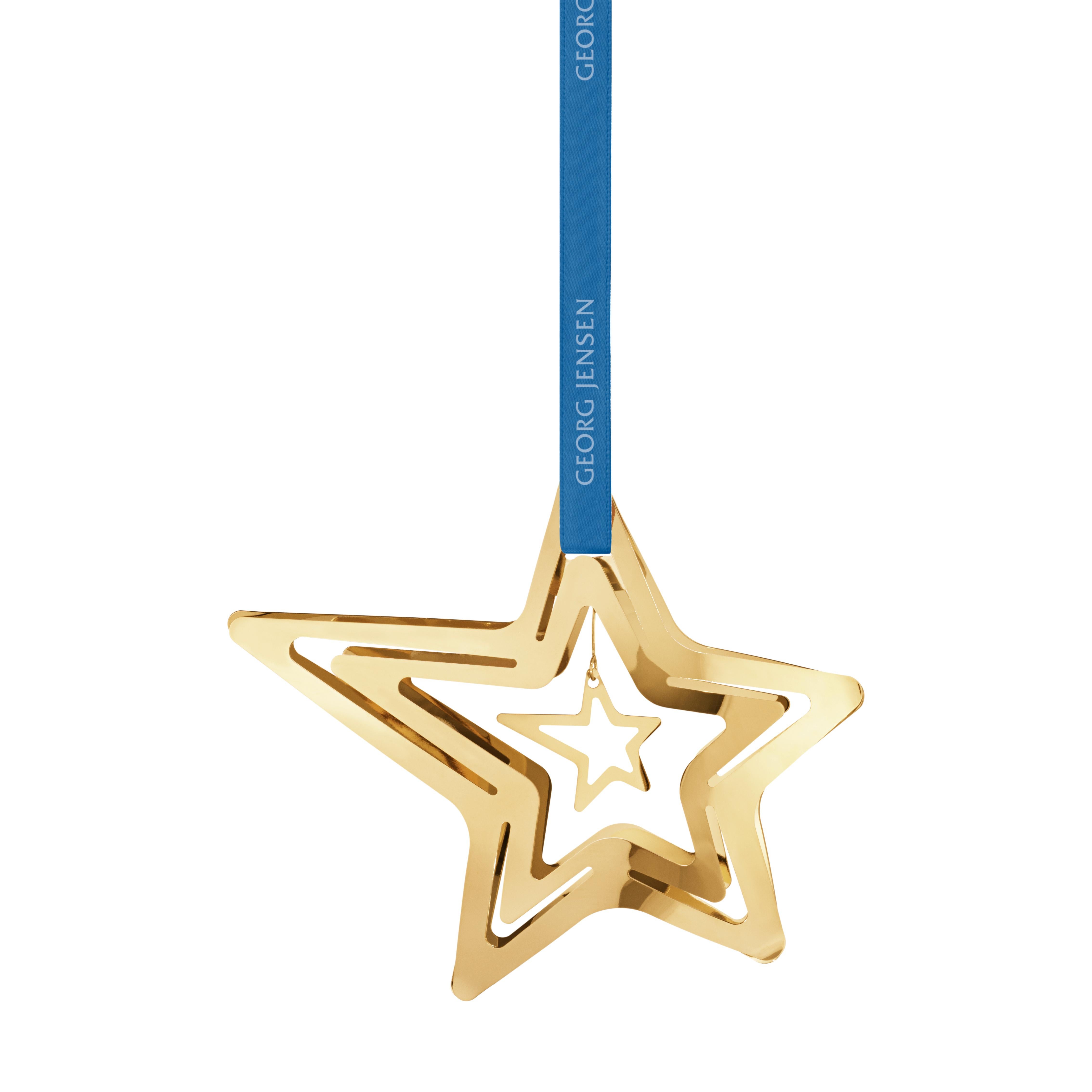The magic of a crisp and clear winter night sky is captured in this 18 karat gold plated shooting star mobile. Part of Georg Jensen’s annual Christmas Collectibles collection, the star symbolizes the optimism and joy of the Christmas season as it