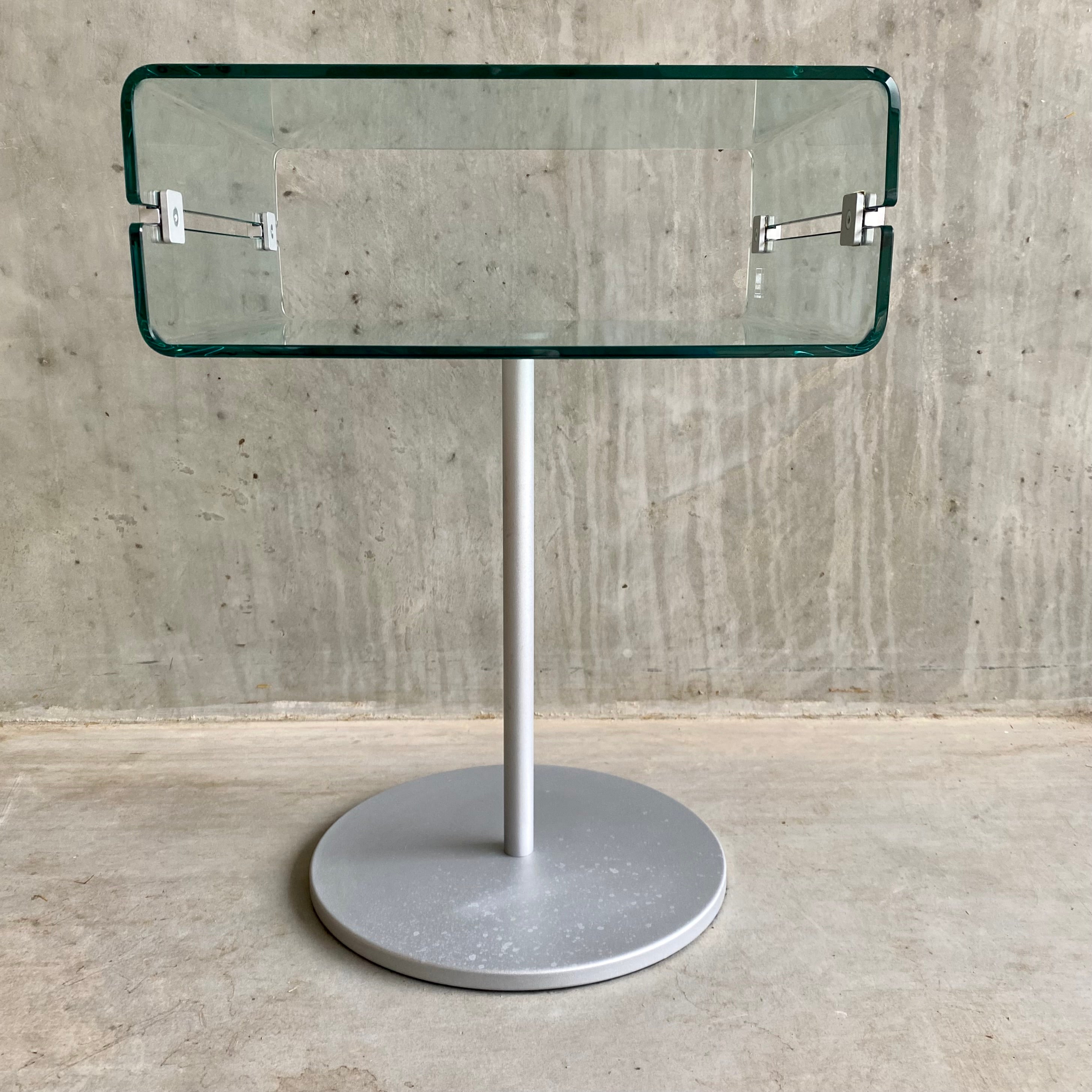 The C&C night table by Christophe Pillet for Fiam Italia is the perfect addition to any contemporary living space. With its sleek and sophisticated design, this piece of furniture can also double as a side table.

Christophe Pillet, the renowned