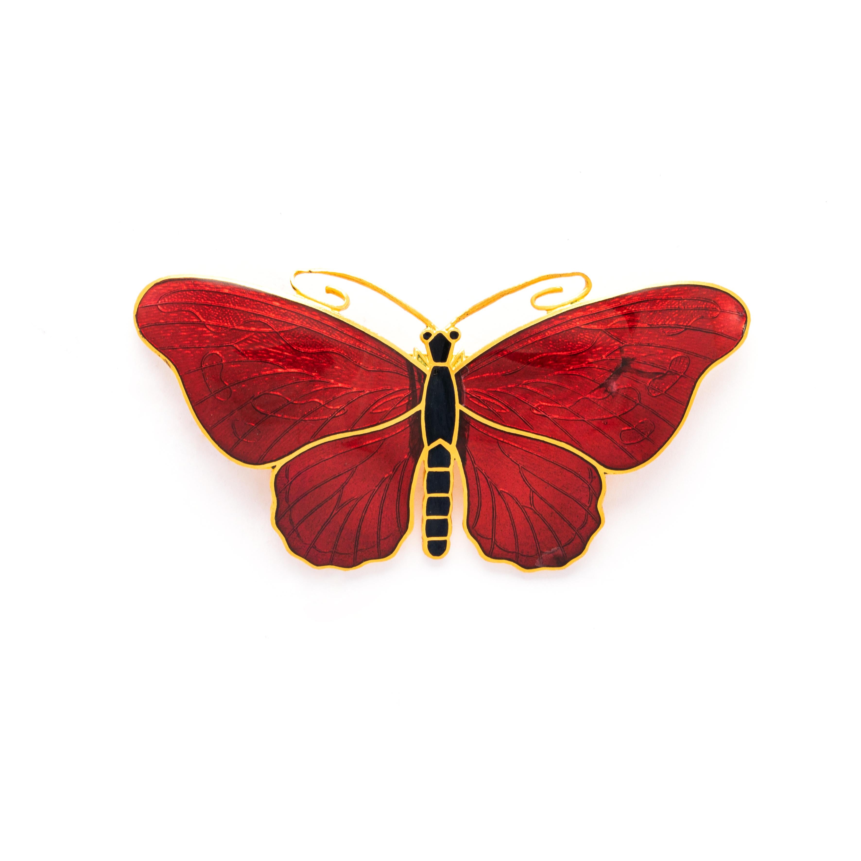 Butterfly Brooch enameled on yellow metal.
Total weight: 14.05 grams.
Dimensions: 6.10 x 3.00 centimeters.

Signed CC. Sporrong and Co. 
STOCKHOLM.
