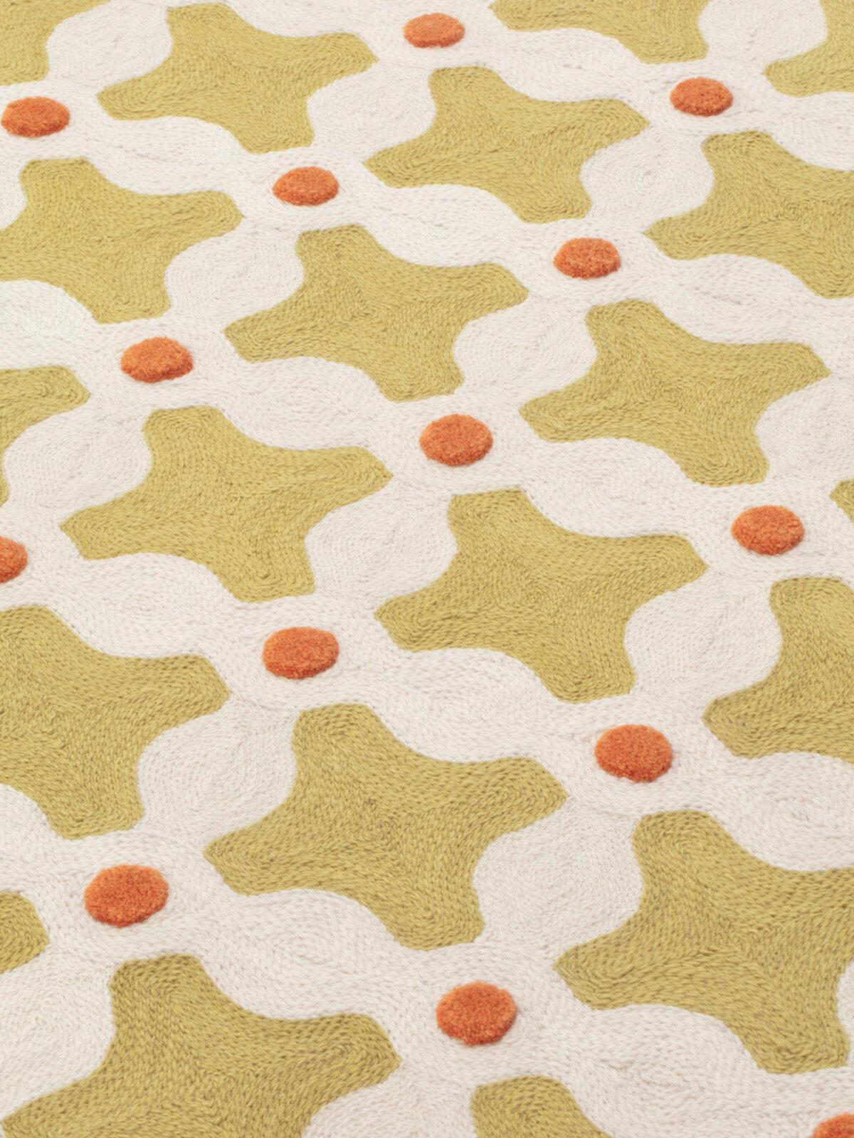 Crisscross is a collection of rugs designed by designer India Mahdavi for the CC-Tapis brand. These rugs are expertly crafted using fine hand-woven wool combined with the artisanal chain-stitch technique, which gives them an intricate weave and