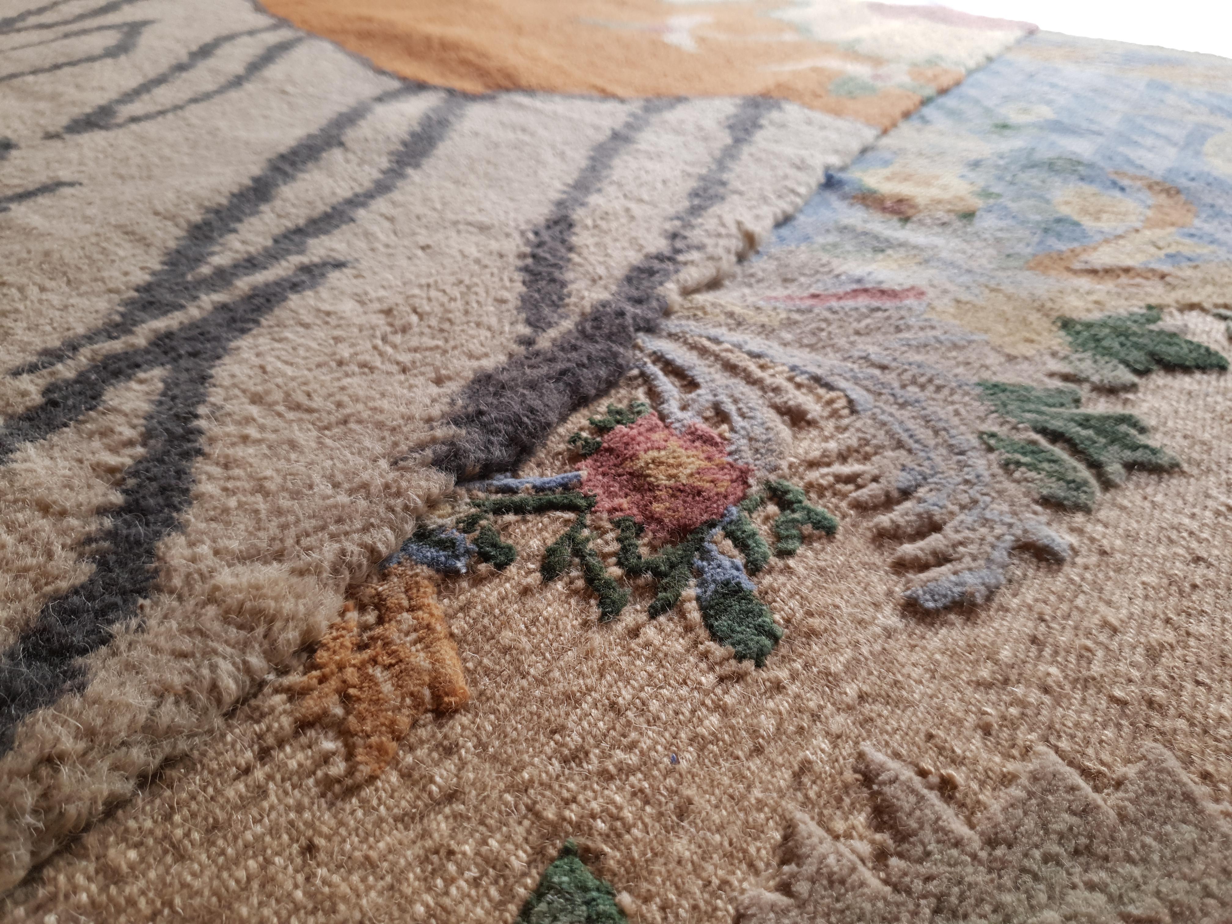 Hand knotted in the cc-tapis atelier in Kathmandu, Nepal. The rug is made with a cotton weave a Himalayan wool and pure silk coming from the areas surrounding the atelier. 232.000 individual knots per square meter approximately. The sale of every