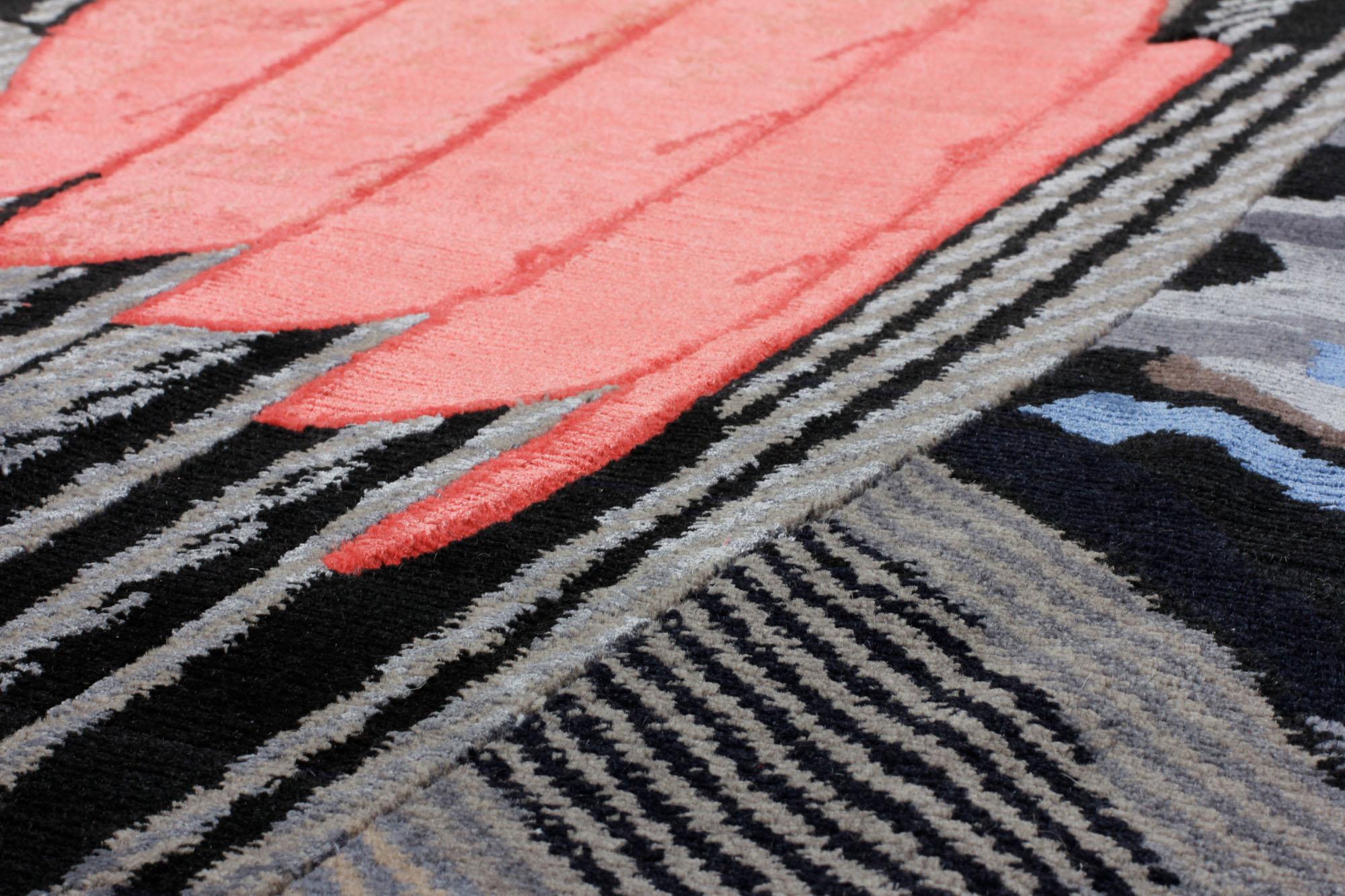 Noué à la main dans l'atelier de cc-tapis à Katmandou, au Népal. Le tapis est réalisé avec un tissage en coton et une laine de l'Himalaya et une soie pure provenant des environs de l'atelier. 252.000 nœuds individuels par mètre carré environ. La