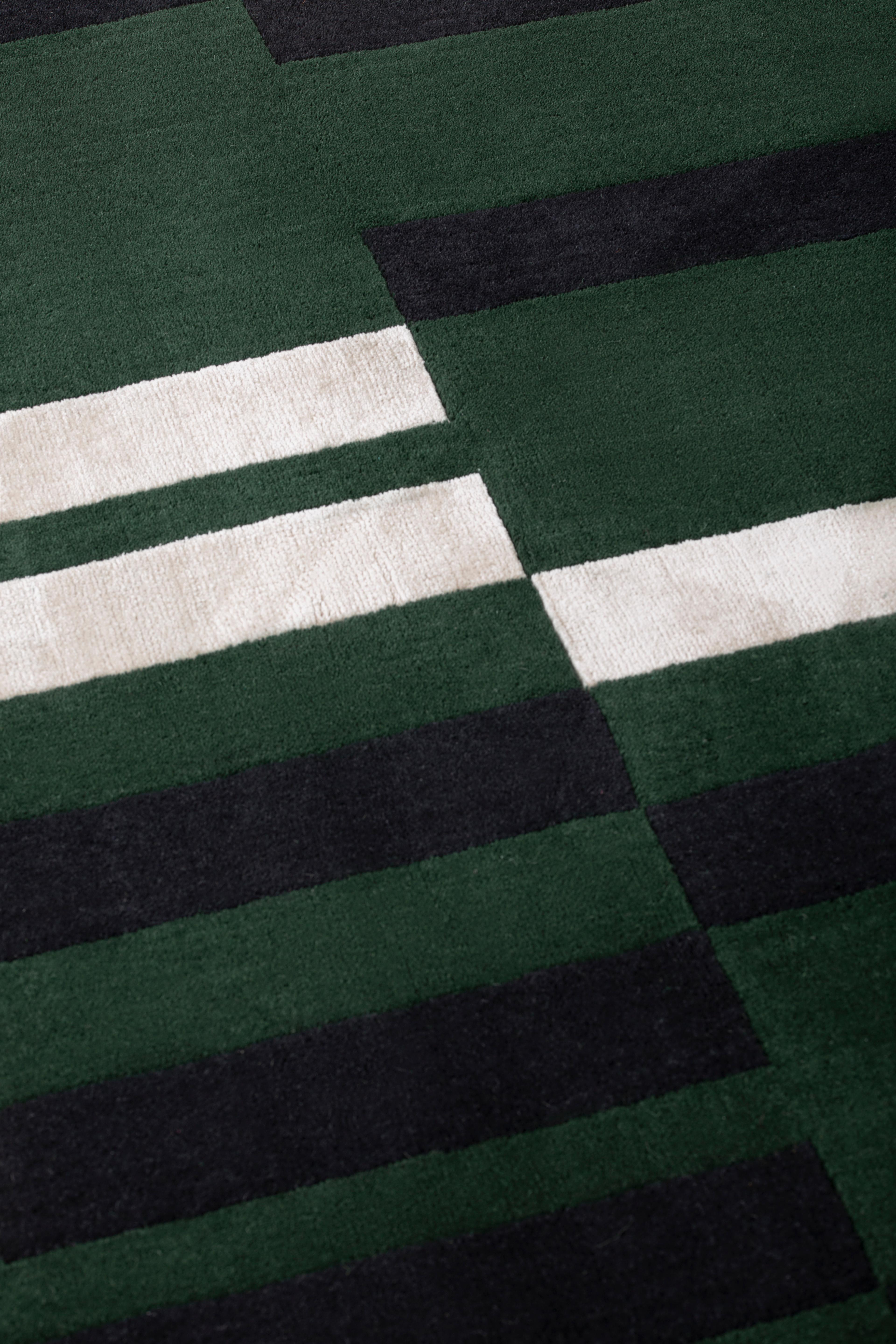 Starting from natural undyed wool, slight notes of color enter the subtle background of each rug, forming a harmonious relationship like musical notes playing together in rhythm and melody. A musical language which gives life to the new patterns of