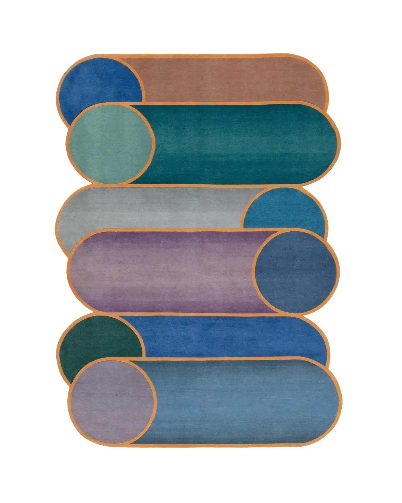 Rotazioni A
Proudly made by hand in Nepal
Designed by Patricia Urquiola
Designed by Patricia Urquiola, Rotazioni plays on the repetition of overlapping cylindrical forms that emphasize the circle as the matrix of the design. A scale of pastel colors