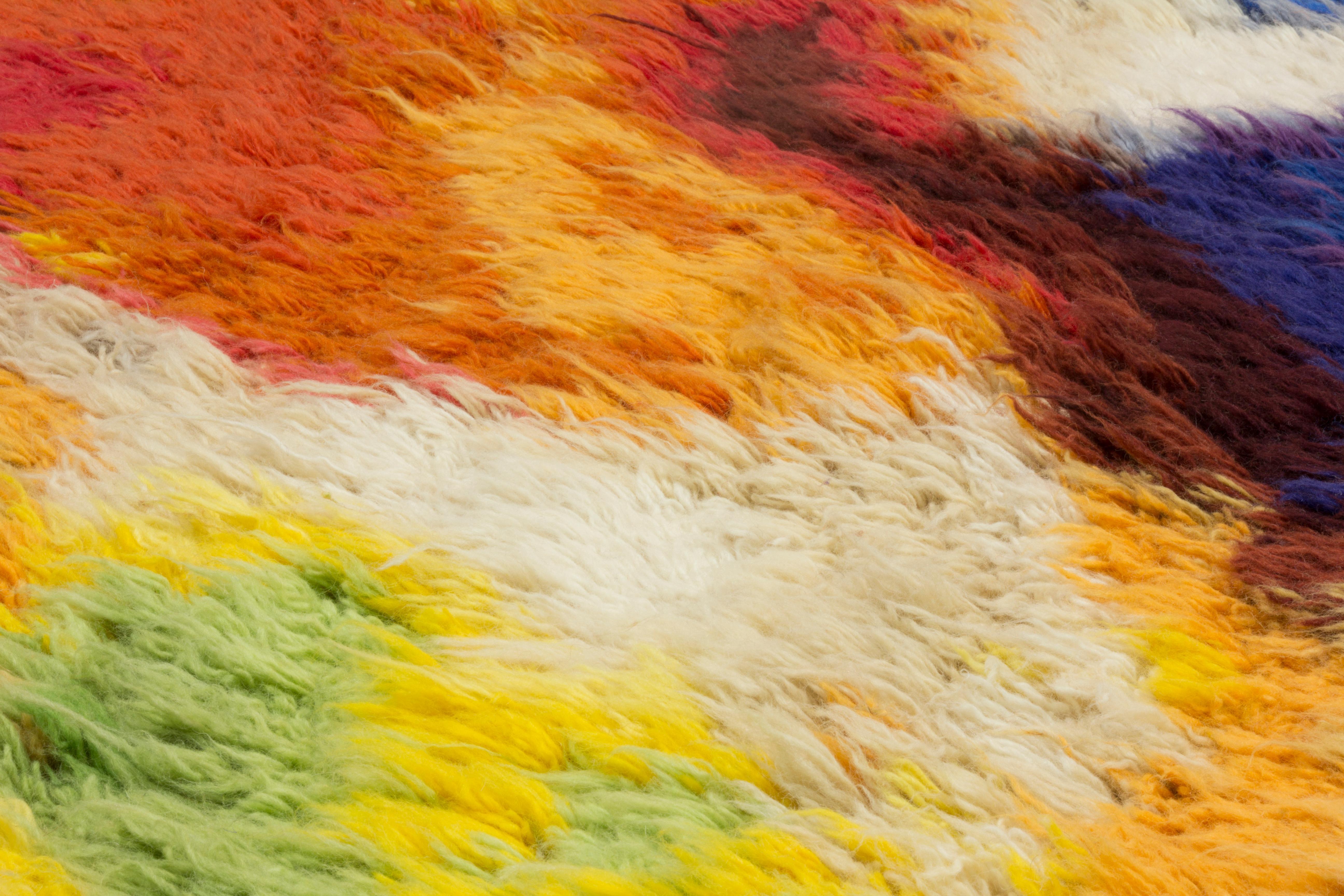 Hand knotted in the cc-tapis atelier in Kathmandu, Nepal. The rug is made with a cotton weave, Himalayan wool, silk and metallic fibre coming from the areas surrounding the atelier. Produced with the Moroccan loom technique. The sale of every rug