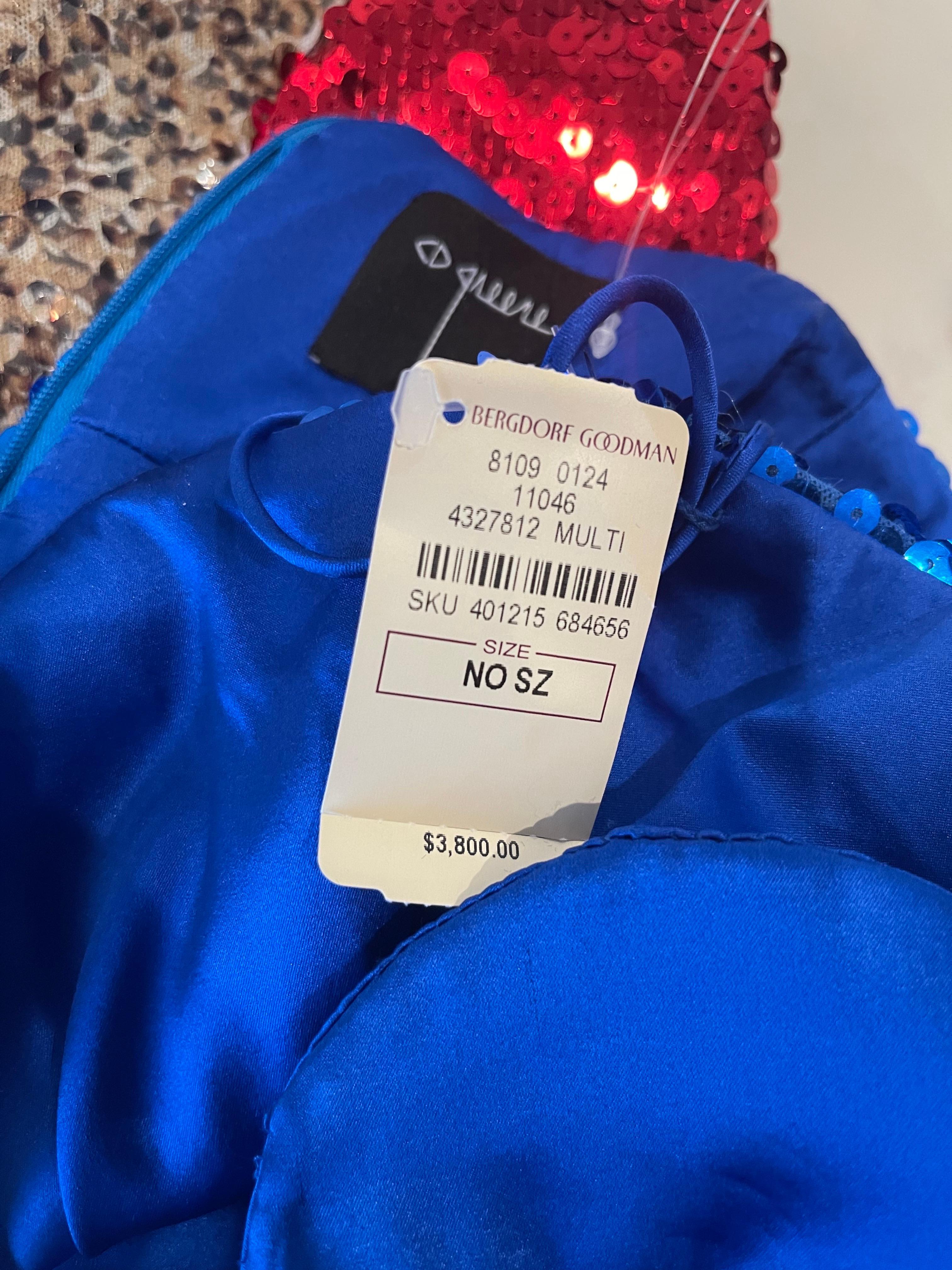 Beautiful brand new 2000s C.D. GREENE dress, with original $3,800 Bergdorf Goodman price tag still attached. Royal blue, with purple, gold and red bulls eye on the side. Hidden zipper up the back with hook-and-eye closure. Incredible amount of time