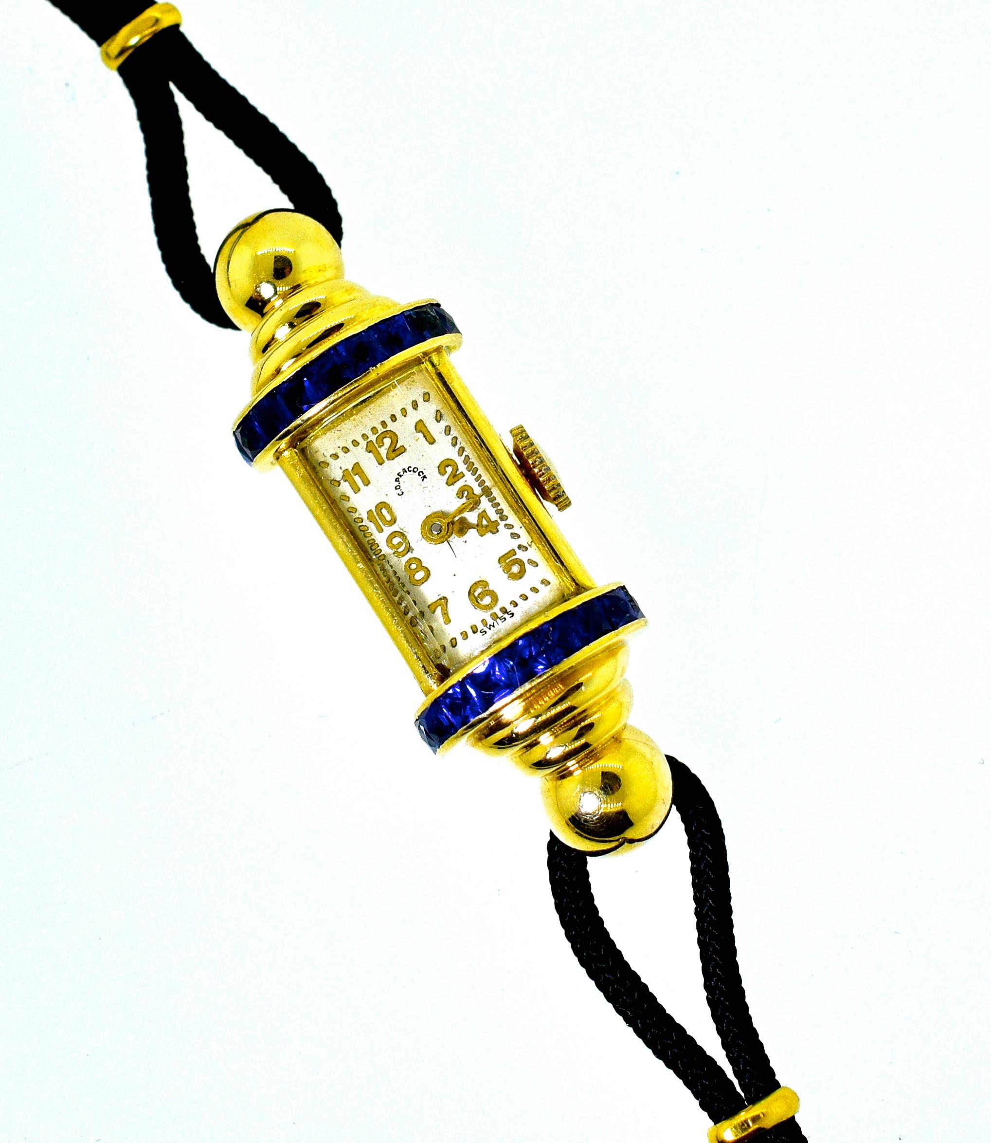 C.D. Peacock, a fine and collected early 20th century watch company has made this ladies wristwatch which has a strong retro, Art Moderne, design.  There are 18 natural French cut sapphires, probably unheated Burma stones, as evident of their fine