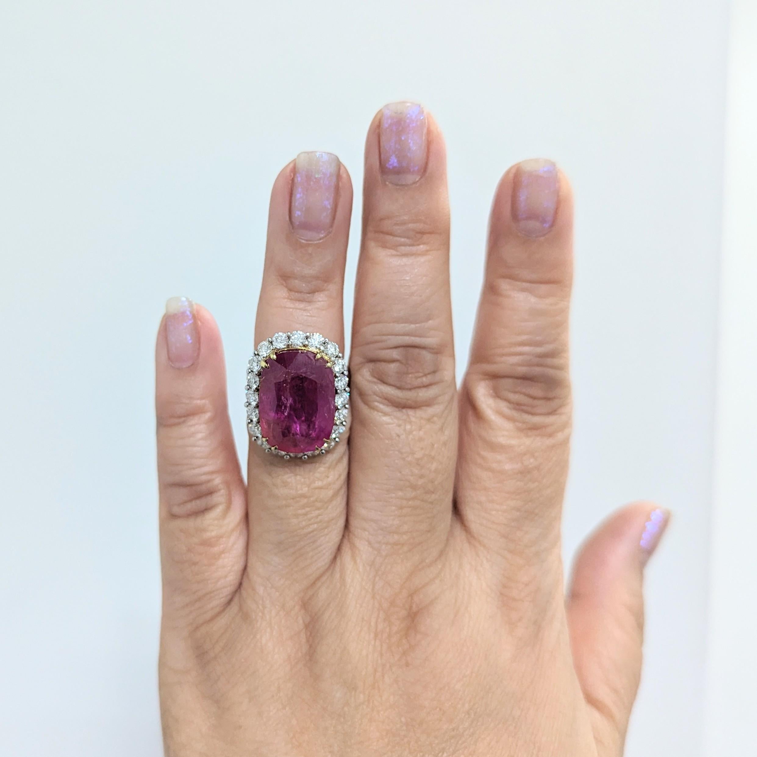 Gorgeous 22.02 ct. unheated Burma ruby cushion with good quality, white, and bright diamond rounds.  Handmade in platinum and 18k yellow gold.  Ring size 6+.  Comes with C. Dunaigre certificate.