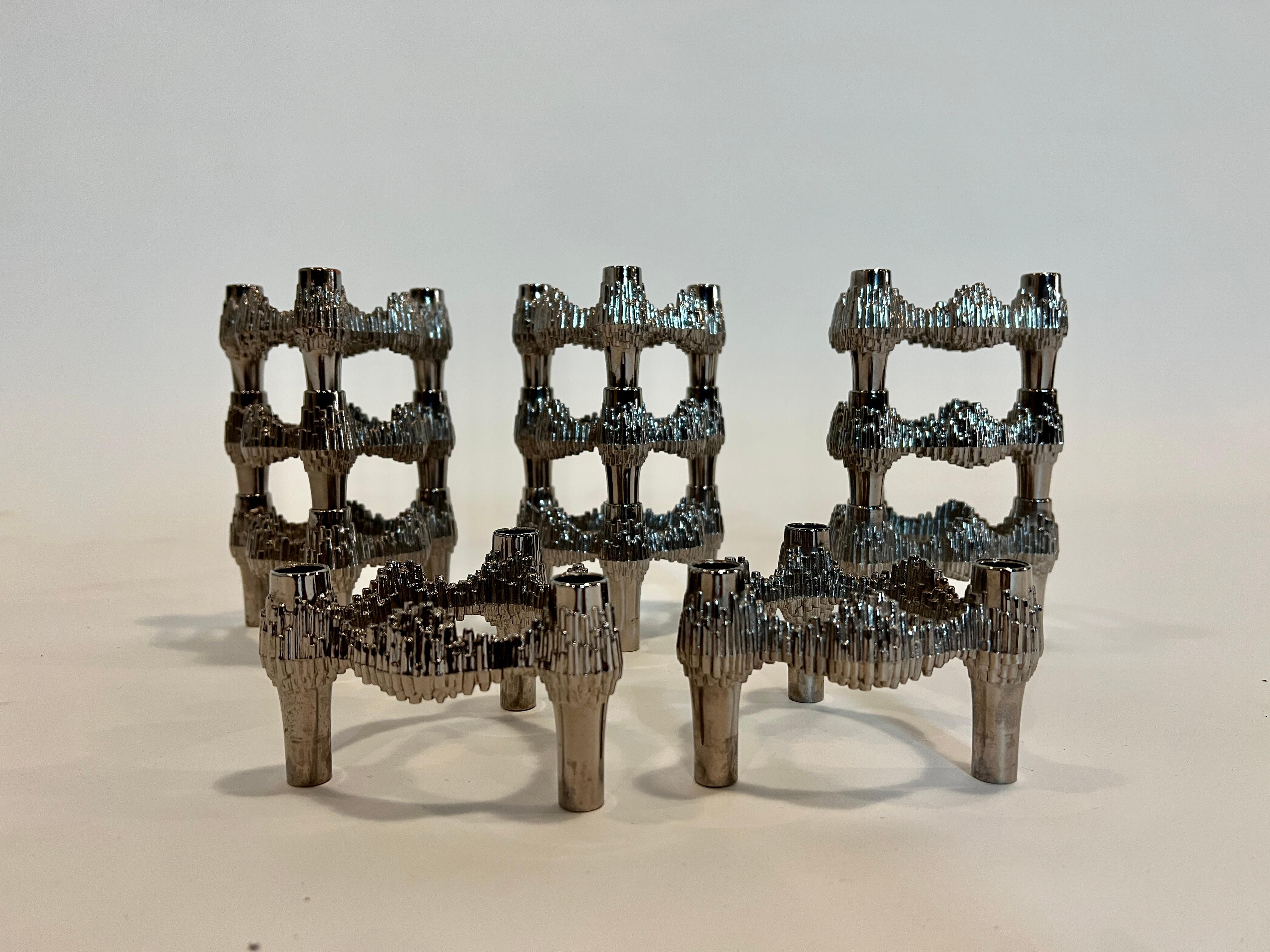 Set of 11 brutalist style nickel-plated Variomaster candleholders designed by Caesar Stoffi & Fritz Nagel. Manufactured by Quist/BMF in West Germany Model: Variomaster-3 flame.