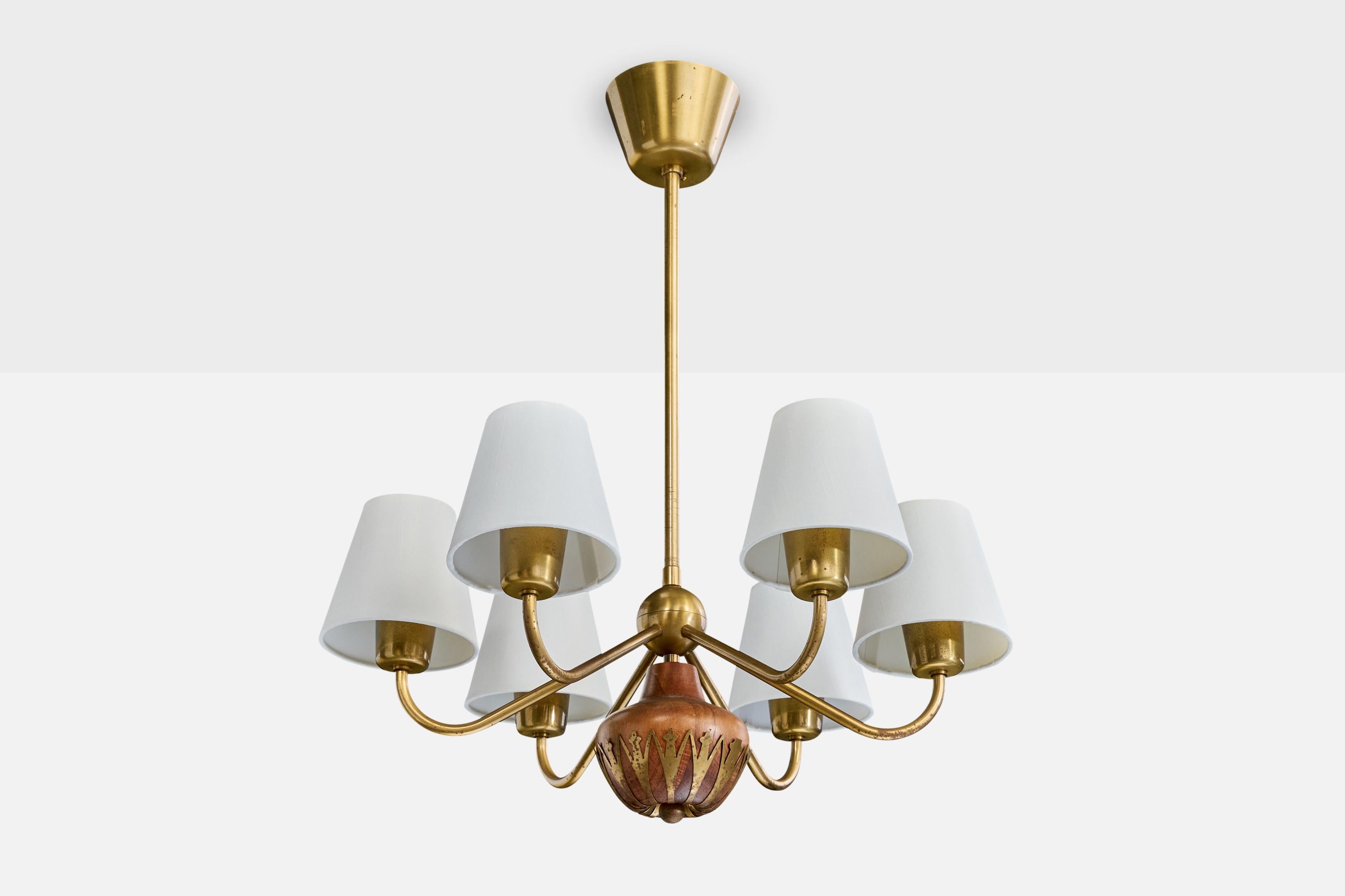 A brass, wood and white fabric chandelier produced by Cebe, Sweden, c. 1940s.

Overall Dimensions (inches): 26.0