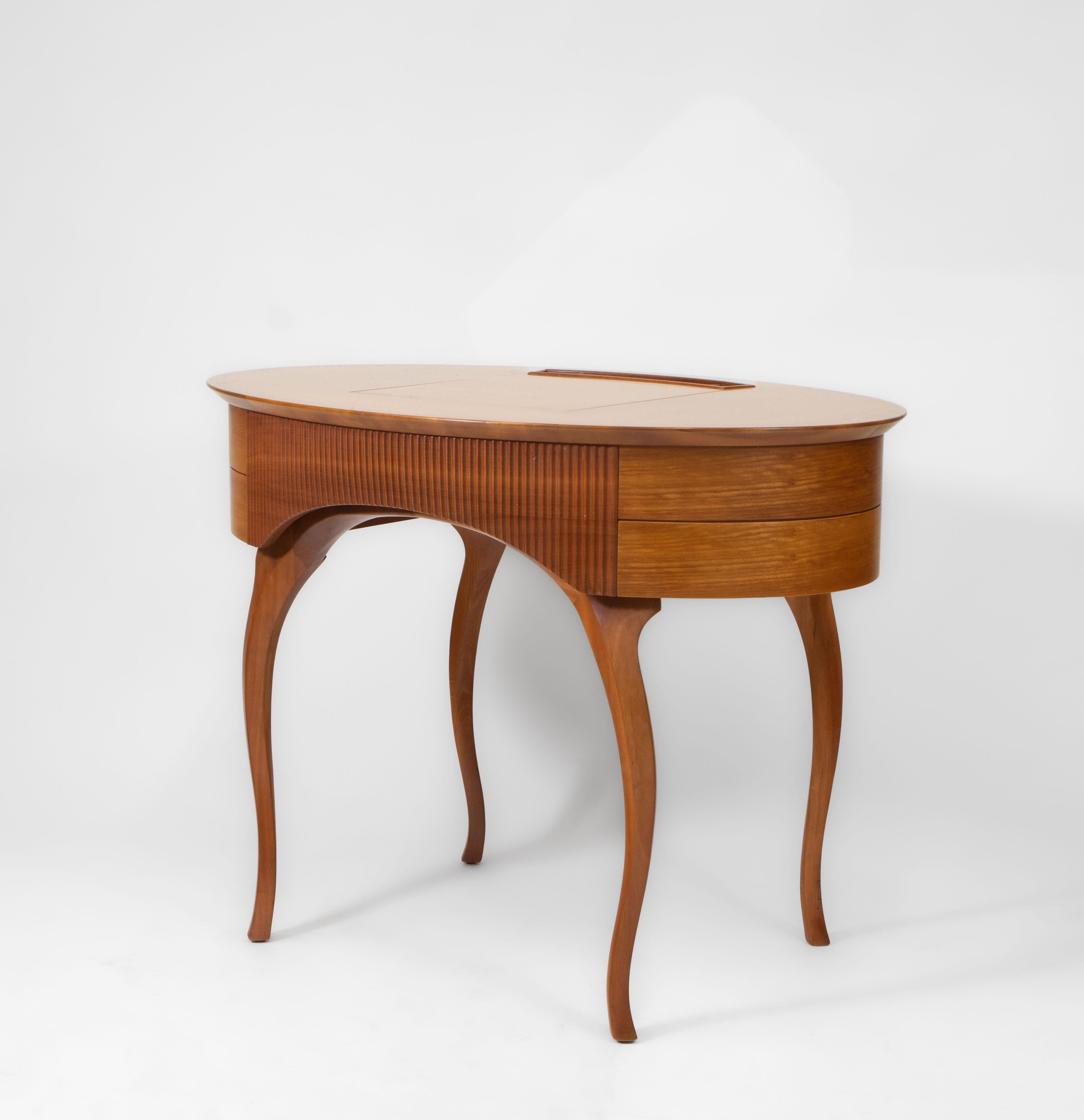 A Ceccotti 'Arabella' Cherrywood dressing table/desk designed in 1992 by Fabrizia Scassellati from Roberto Lazzeroni's work. Branded 'Ceccotti Collezioni. Made in Italy' Circa 1990s.

Influenced by the eclectic and surrealistic world of Gaudi,
