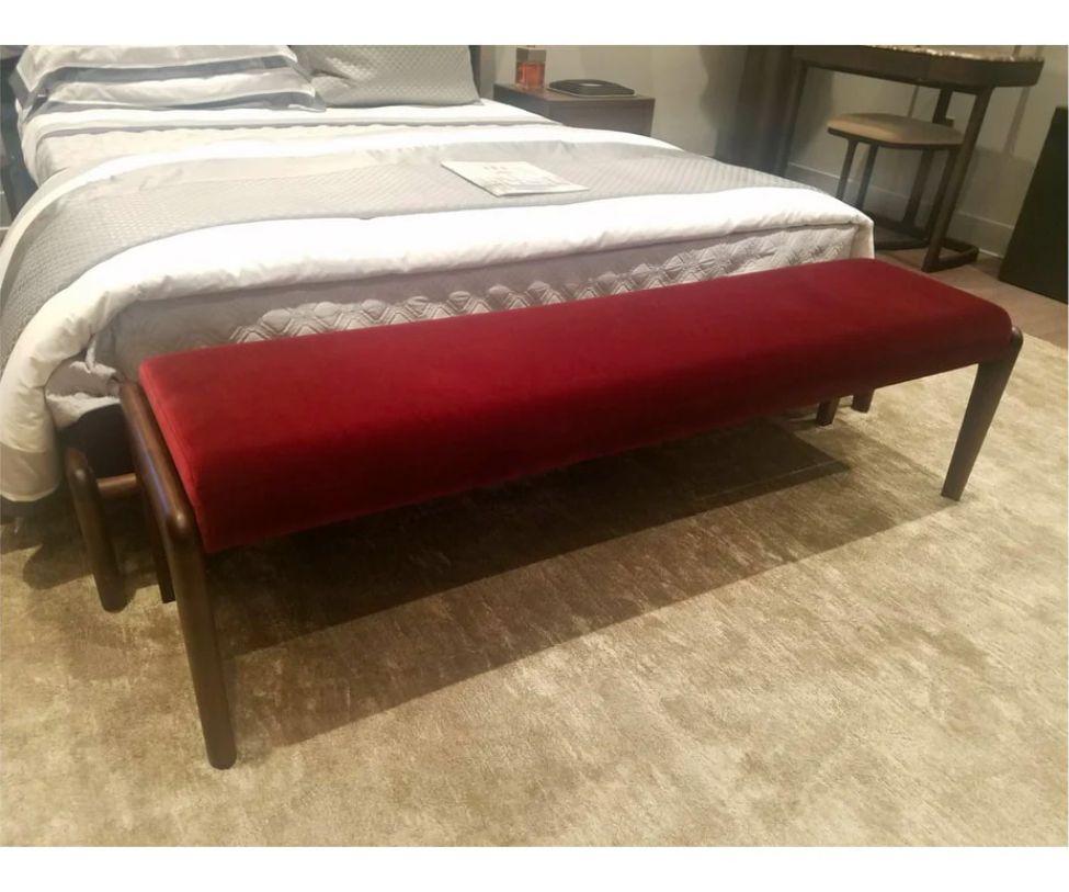 Designed By Roberto Lazzeroni 

Bed and end bench made in solid American walnut, bed base in veneered plywood, upholstered headboard, bed fascias, and bench seat.

Frame: Dark American Walnut.

Fabric: Harald 2 582 (Dark Red