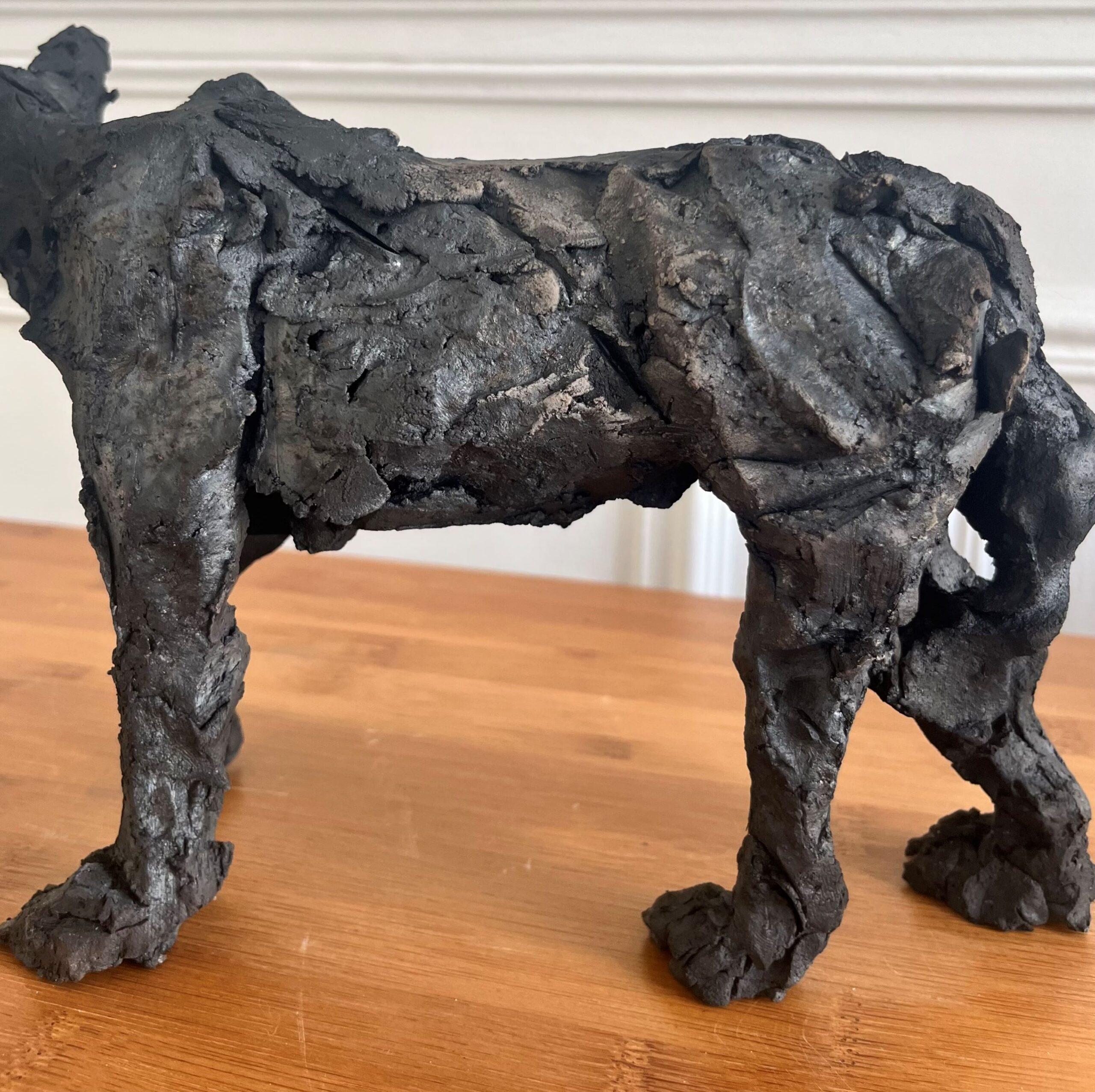 Wolf II is a unique smoke-fired sandstone sculpture by French contemporary artist Cécile Raynal, dimensions are 19 × 9 × 27 cm (7.5 × 3.5 × 10.6 in). 
This sculpture is unique and comes with an authenticity certificate.

Cécile Raynal uses sculpture
