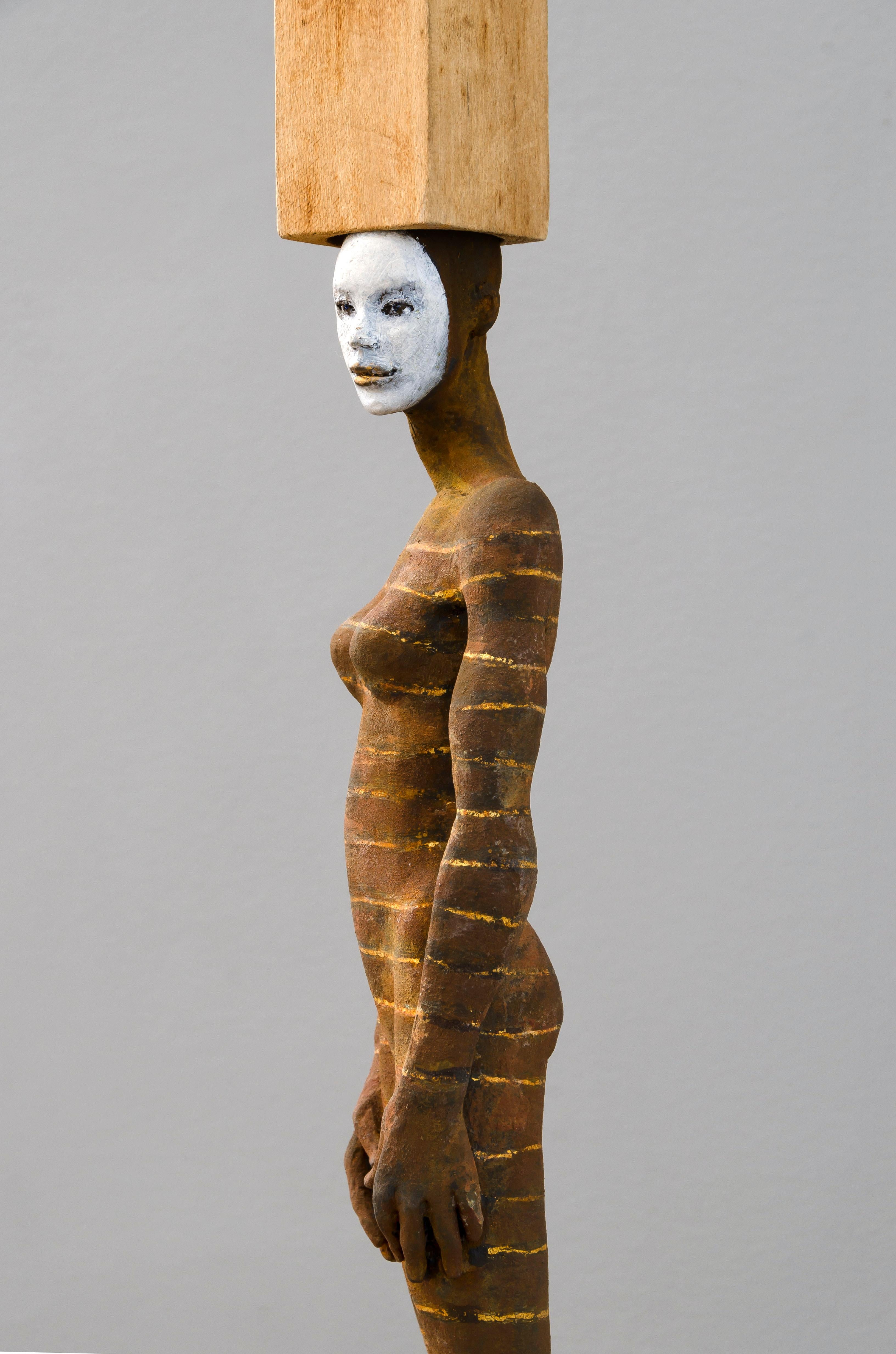Balancing Act, bronze and wood sculpture of female with head accessory - Brown Abstract Sculpture by Cecilia Z. Miguez