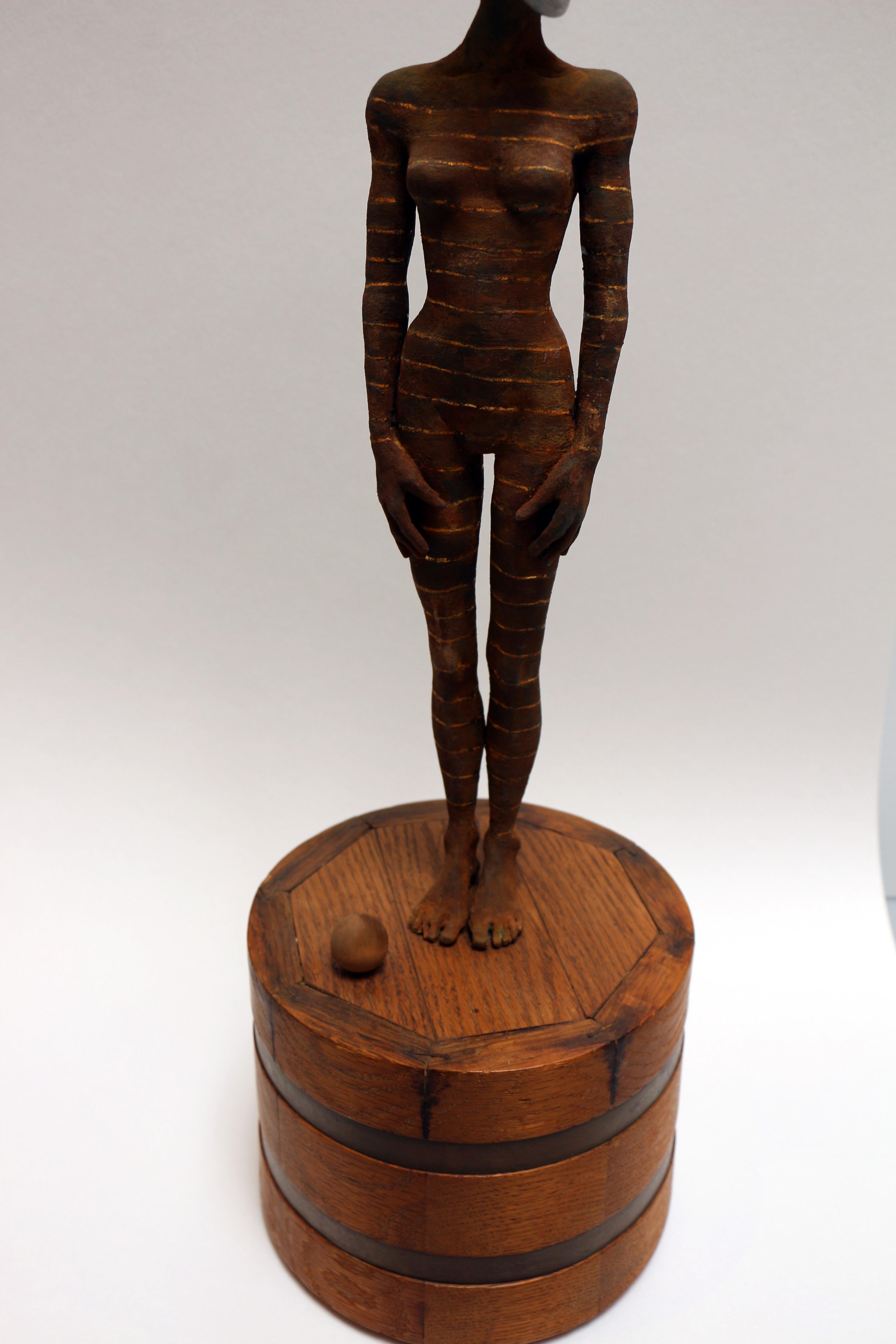 Balancing Act, bronze and wood sculpture of female with head accessory For Sale 2
