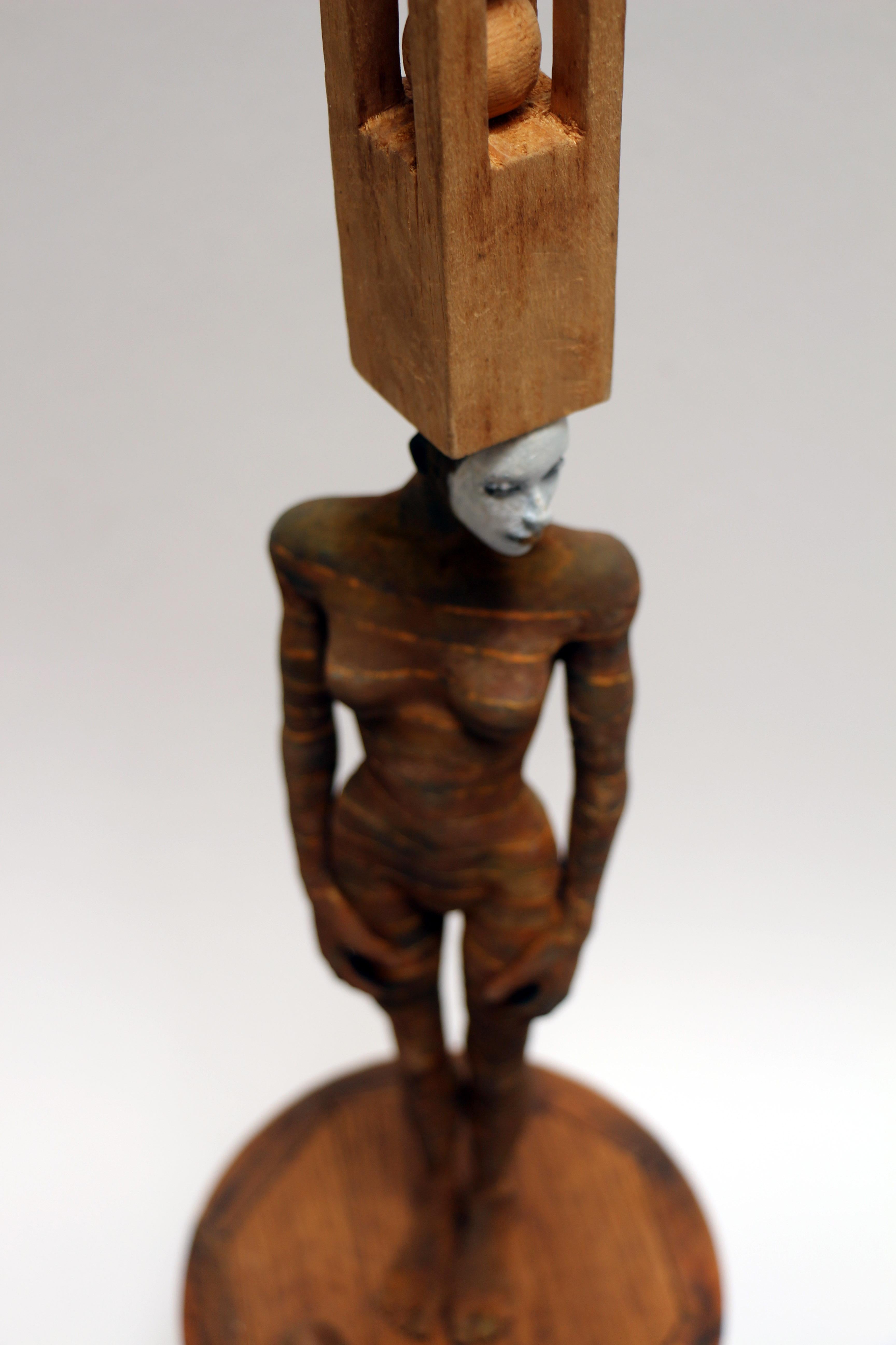 Balancing Act, bronze and wood sculpture of female with head accessory For Sale 3