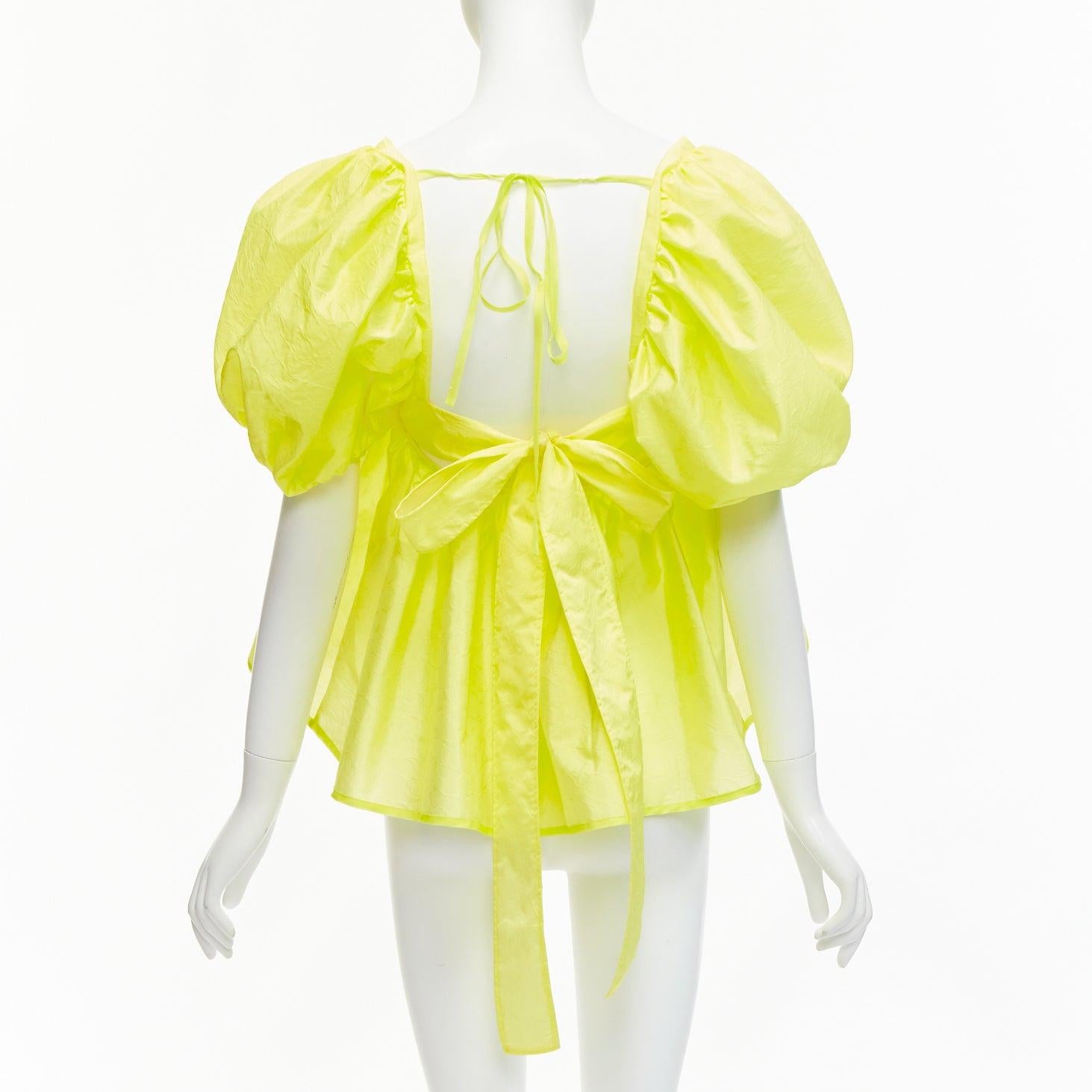 CECILIE BAHNSEN 2021 Babett yellow textured puff sleeve babydoll top UK6 XS
Reference: LNKO/A02274
Brand: Cecilie Bahnsen
Model: Babett
Collection: SS 2021
Material: Polyamide, Blend
Color: Yellow
Pattern: Abstract
Closure: Self Tie
Extra Details:
