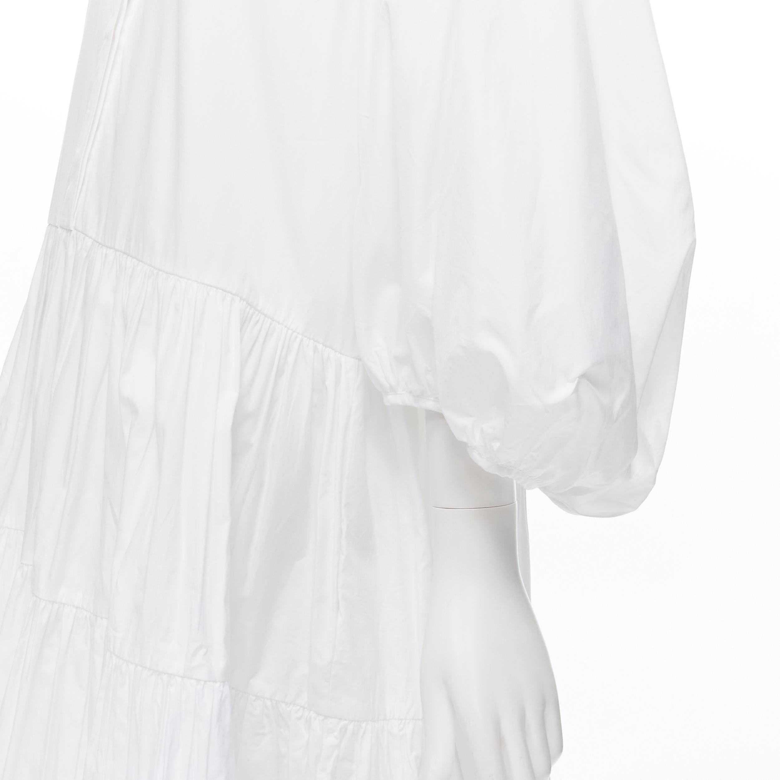 CECILIE BAHNSEN Amy white cotton poplin tiered shirred flared moumou dress UK6 S 
Reference: LNKO/A01901 
Brand: CecIlie Bahnsen 
Material: Cotton 
Color: White 
Pattern: Solid 
Closure: Button 
Extra Detail: Button-down shirt collar. Puff sleeves.