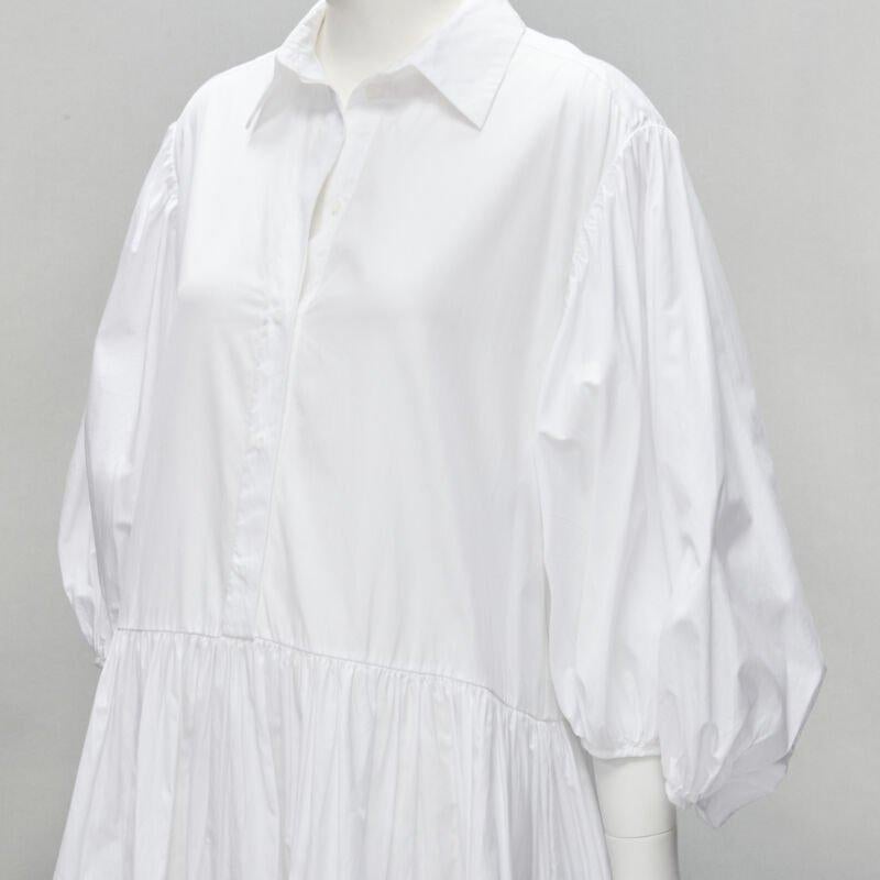CECILIE BAHNSEN Amy Vestido acampanado de popelina de algodón blanco con volantes UK6 S
Referencia: LNKO/A01901
Marca: Cecilie Bahnsen
Model No: Amy
Material: Algodón, mezcla
Color: Blanco
Cierre: Botón
Detalles adicionales: Cuello camisero con