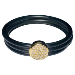 Cede Armband aus 18 Karat Gelbgold mit Gummi und Diamanten