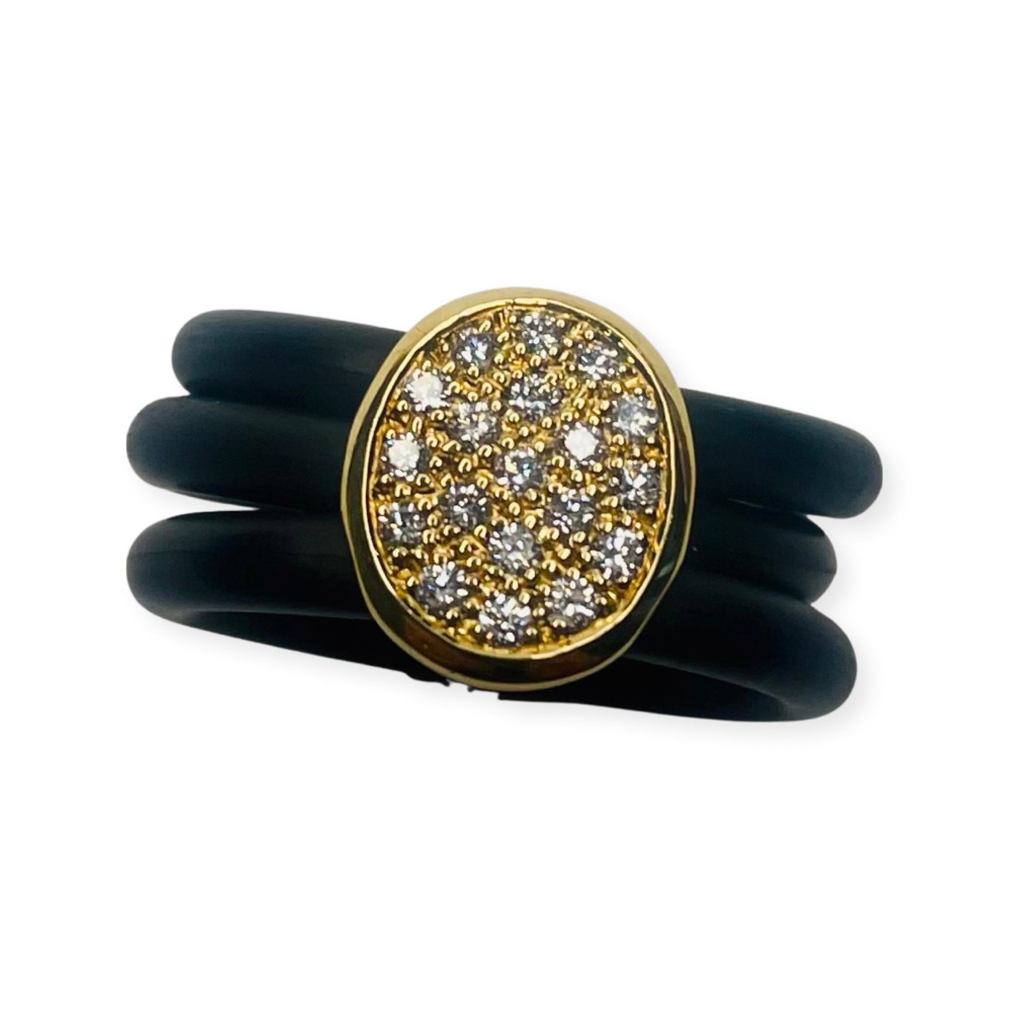18K Yellow Gold and Rubber Cede Ring with Pave Set Diamonds.  There is a total diamond weight of 0.285 cts. The diamonds are of VS Clarity and GH Color. The shank is 8.25 mm wide with a triple row of rubber rings.  The top is oval 18KY Gold and