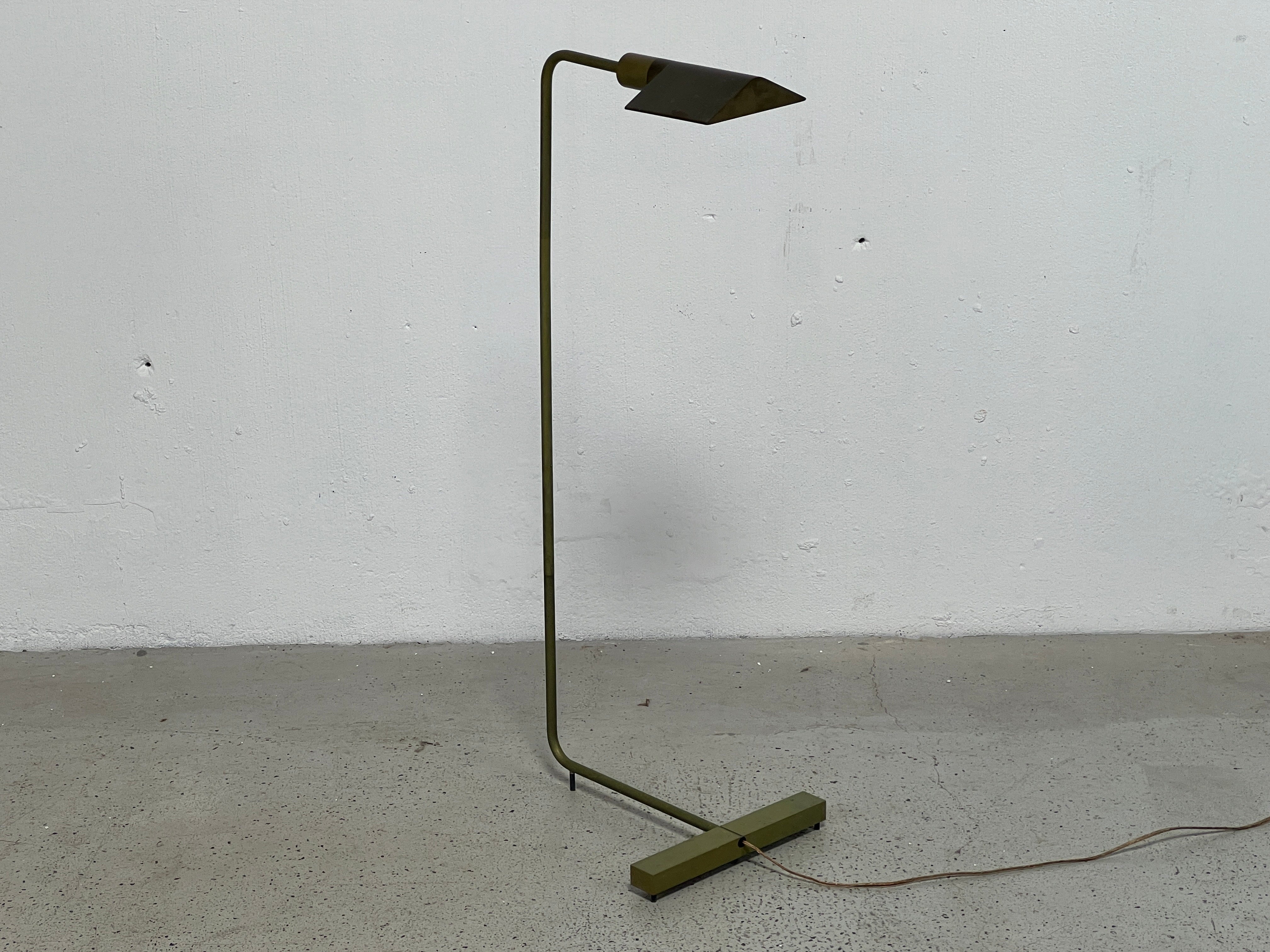 An early example of a classic form by Cedric Hartman in bronze and brass with a beautiful greenish patina.