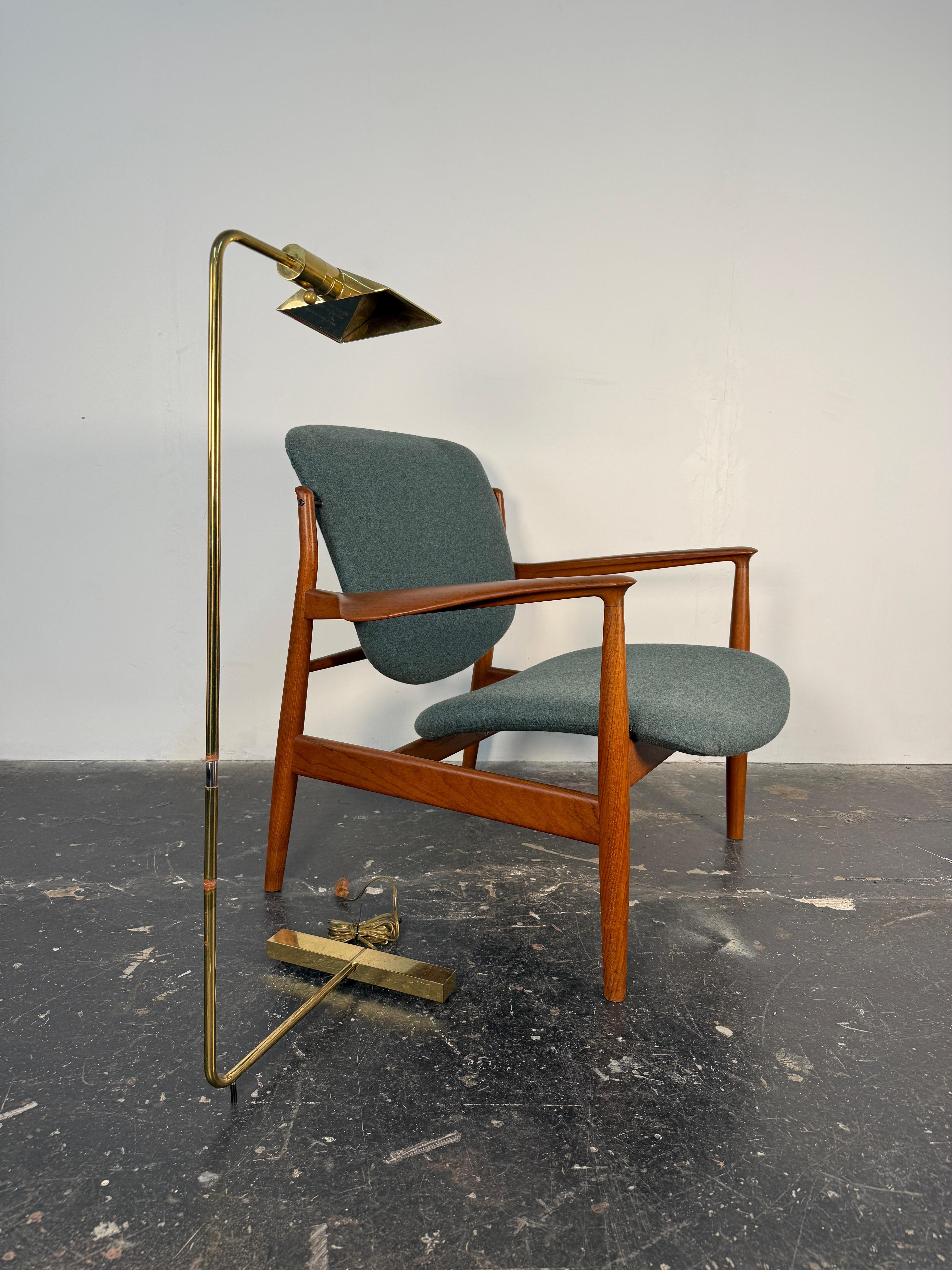 Bring timeless sophistication into your space with this stunning Cedric Hartman polished bronze floor lamp, a masterclass in Mid-Century Modern design. Crafted in the USA circa 1960s, this elegant floor lamp showcases Hartman's signature minimalist