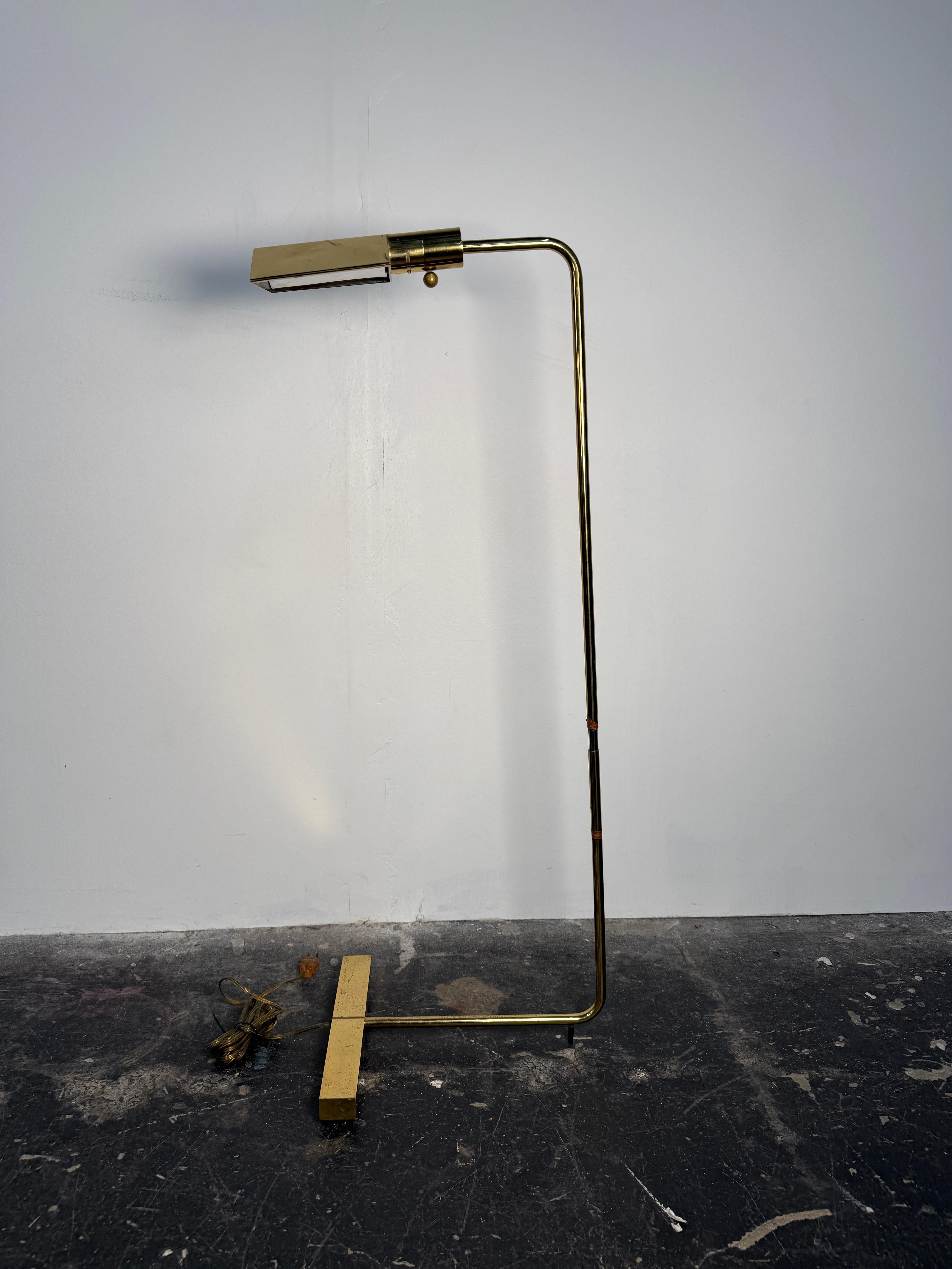 Bring timeless sophistication into your space with this stunning Cedric Hartman polished bronze floor lamp, a masterclass in Mid-Century Modern design. Crafted in the USA circa 1960s, this elegant floor lamp showcases Hartman's signature minimalist