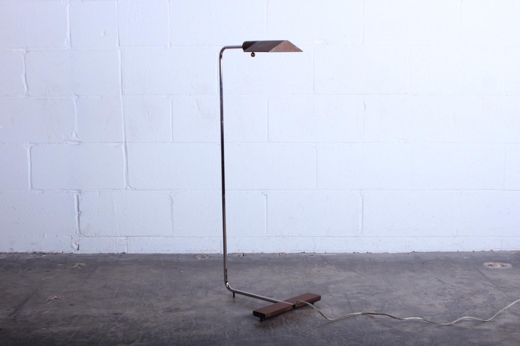 Cedric Hartman adjustable height floor lamp in patinated brass and chrome.