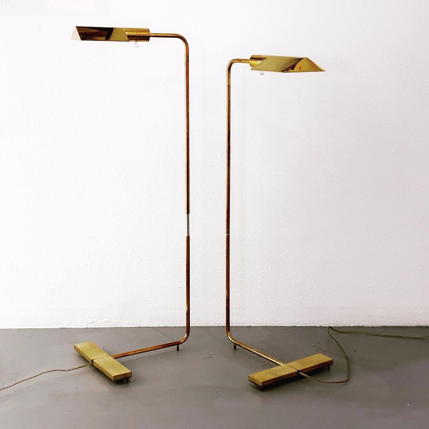 Cedric Hartman Pair Signed Adjustable Brass Reading Lamps Model 1UWV, 1967 Design.

This model is officially called the Low Profile Luminaire and is in the collection of the Museum of Modern Art. It is an exquisite and minimal designed deserving of