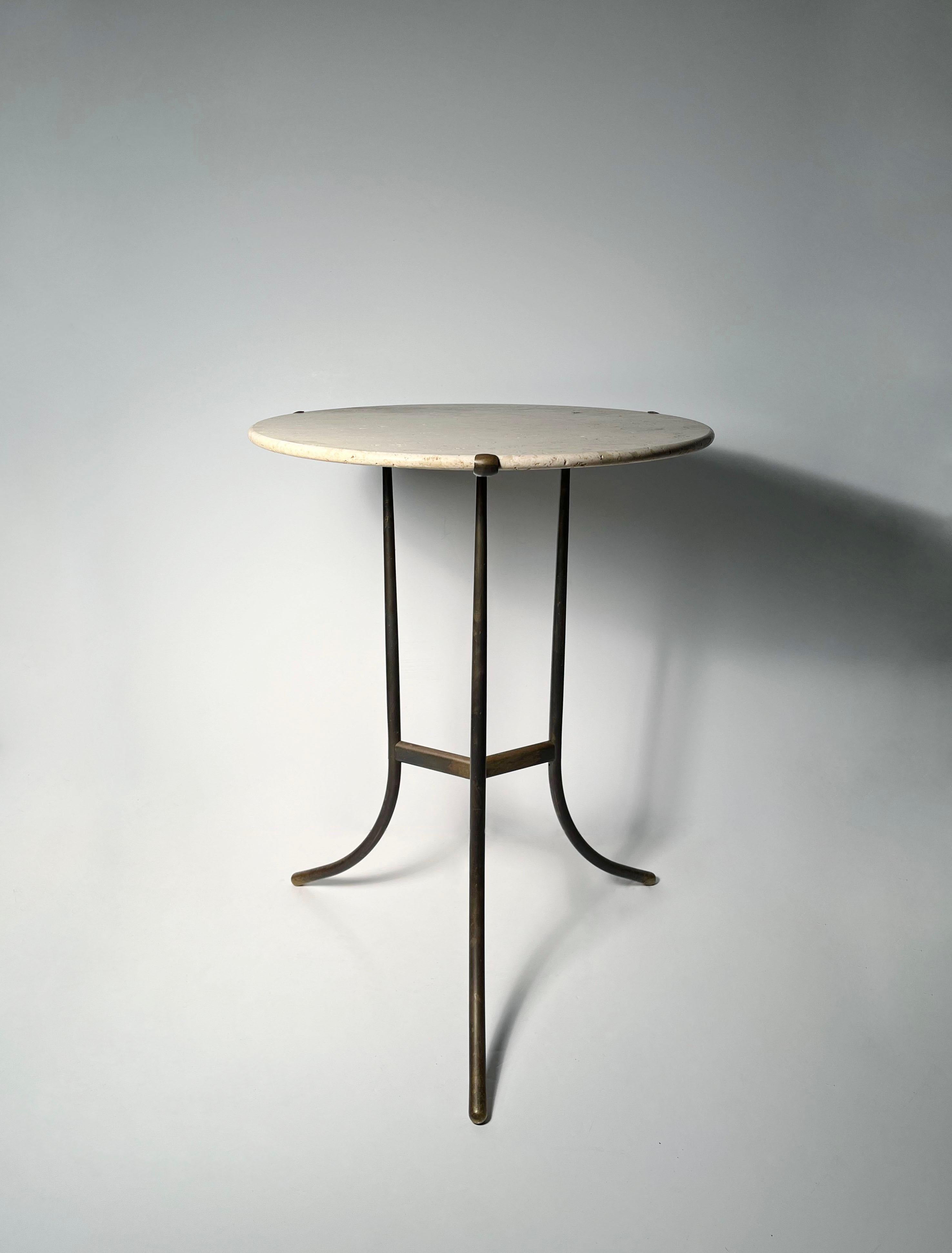 Cedric Hartman Travertine Side Table. Signed & Numbered on bottom.

Table will be shipped with travertine top separate and blanket wrapped.  Clever sliding mechanisms fasten the travertine top into the brass structure.
