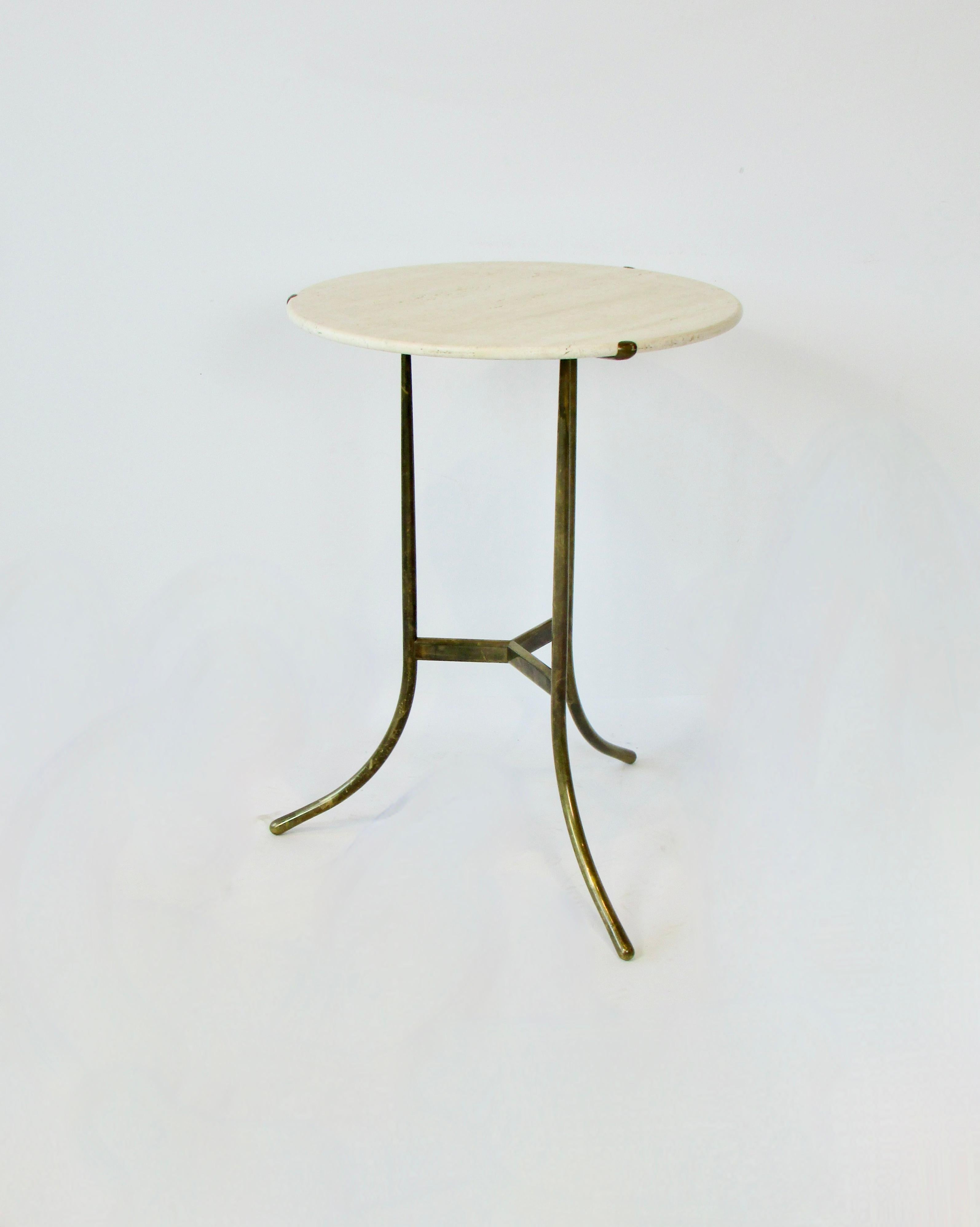  AE table stamped with Cedric Hartman signature MADE IN USA and the number 860434 . The beauty of this Travertine topped side table by Cedric Hartman is in its simple minimal aesthetic .  Three legged base of tubular bronze tapers down in diameter