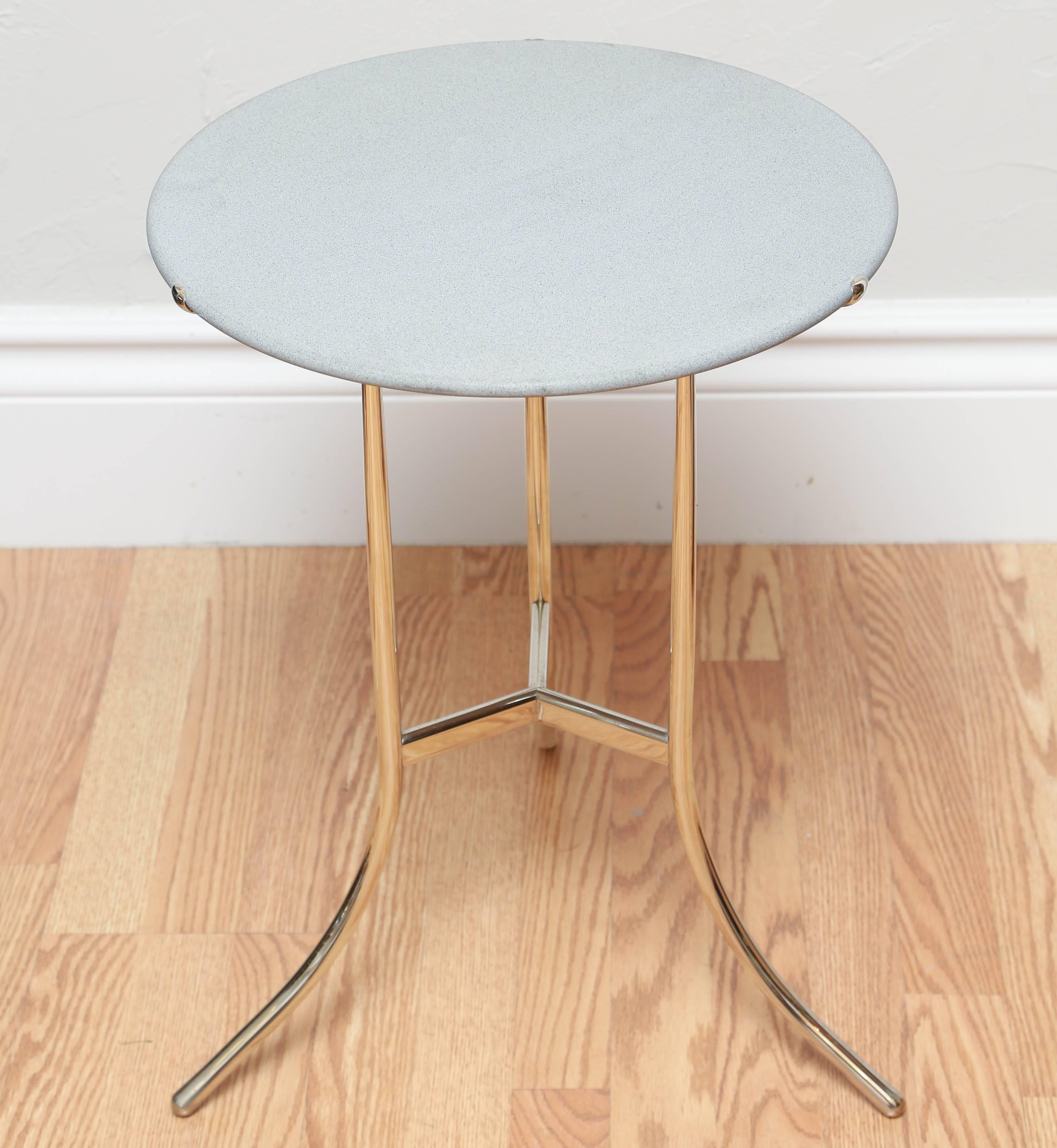Iconic tripod side table with nickel-plated base and sandstone top. Engraved signature on underside.