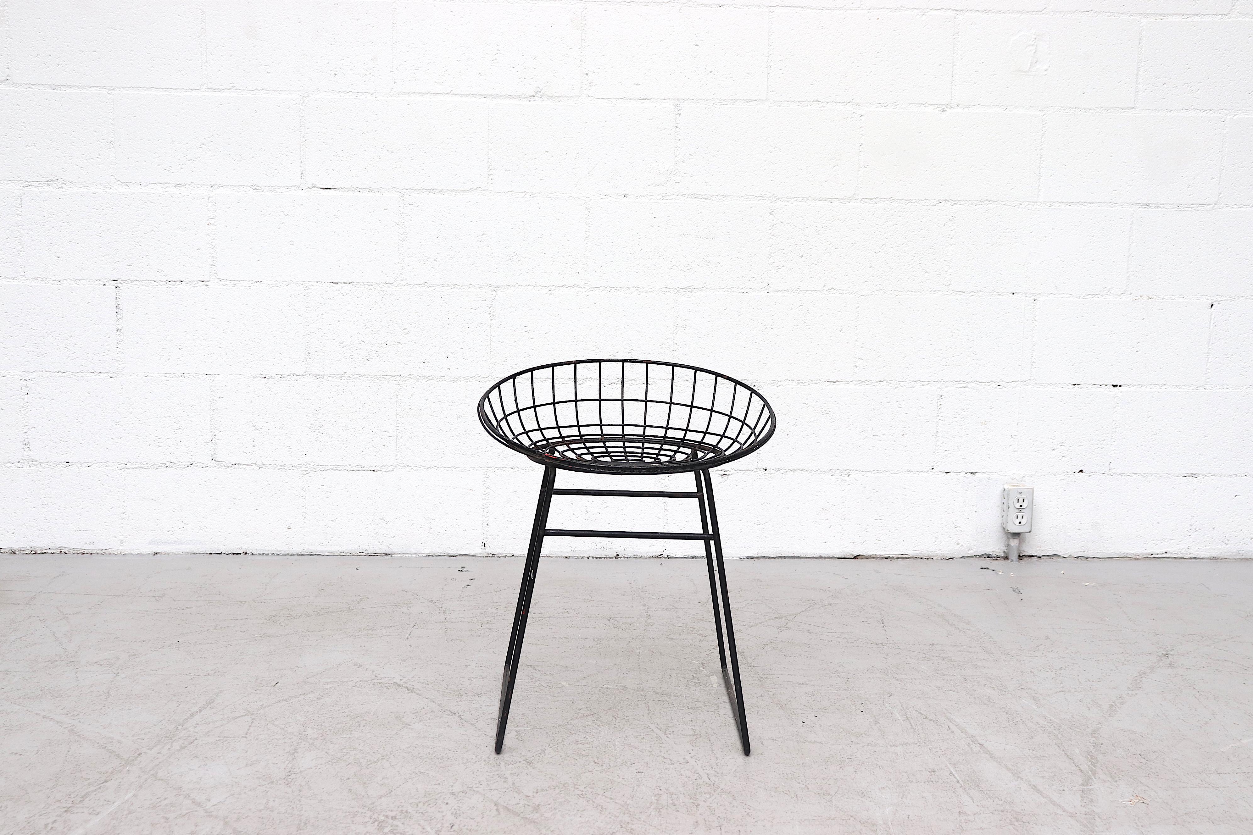 Newly powder-coated black wire vanity stool by Braakman and Dekker. In impressive overall condition with minimal wear or enamel loss. Another stool is available in very original condition with heavy patina and listed separately (LU922418076331) .