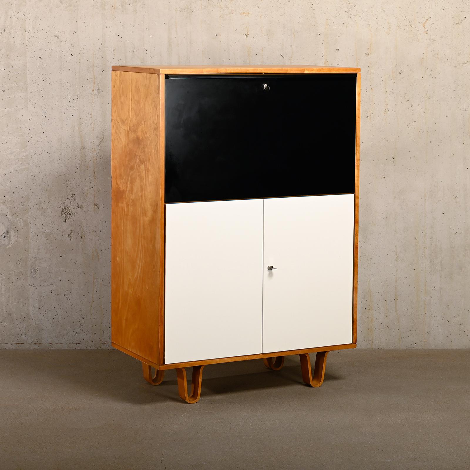 Stylish Secretaire Model CB07 designed by Cees Braakman and manufactured by Pastoe in the 1950s, the Netherlands. This Secretaire was part of the 'Birch Series' of Pastoe and inspired by the new molded plywood technics that came available in the mid