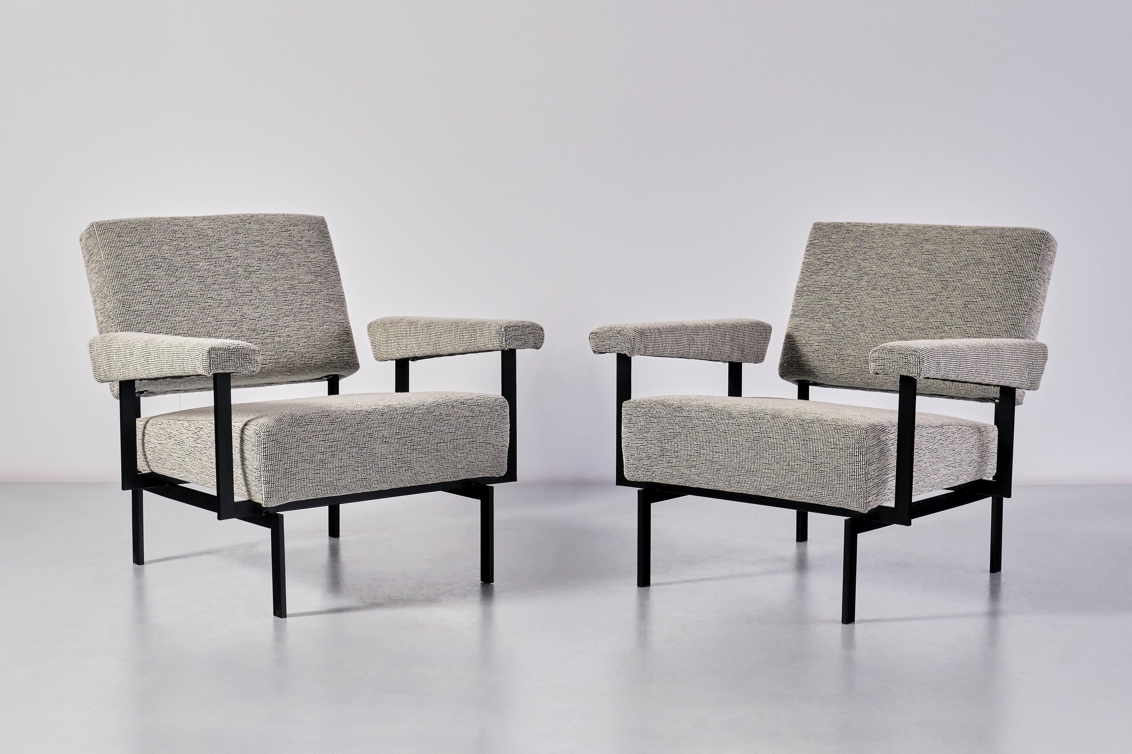 This rare pair of armchairs was designed by Cees Braakman and produced by Pastoe in The Netherlands, circa 1958. This striking model was numbered FM07 and is part of the iconic Japanese series designed by Braakman. 

The design is marked by the