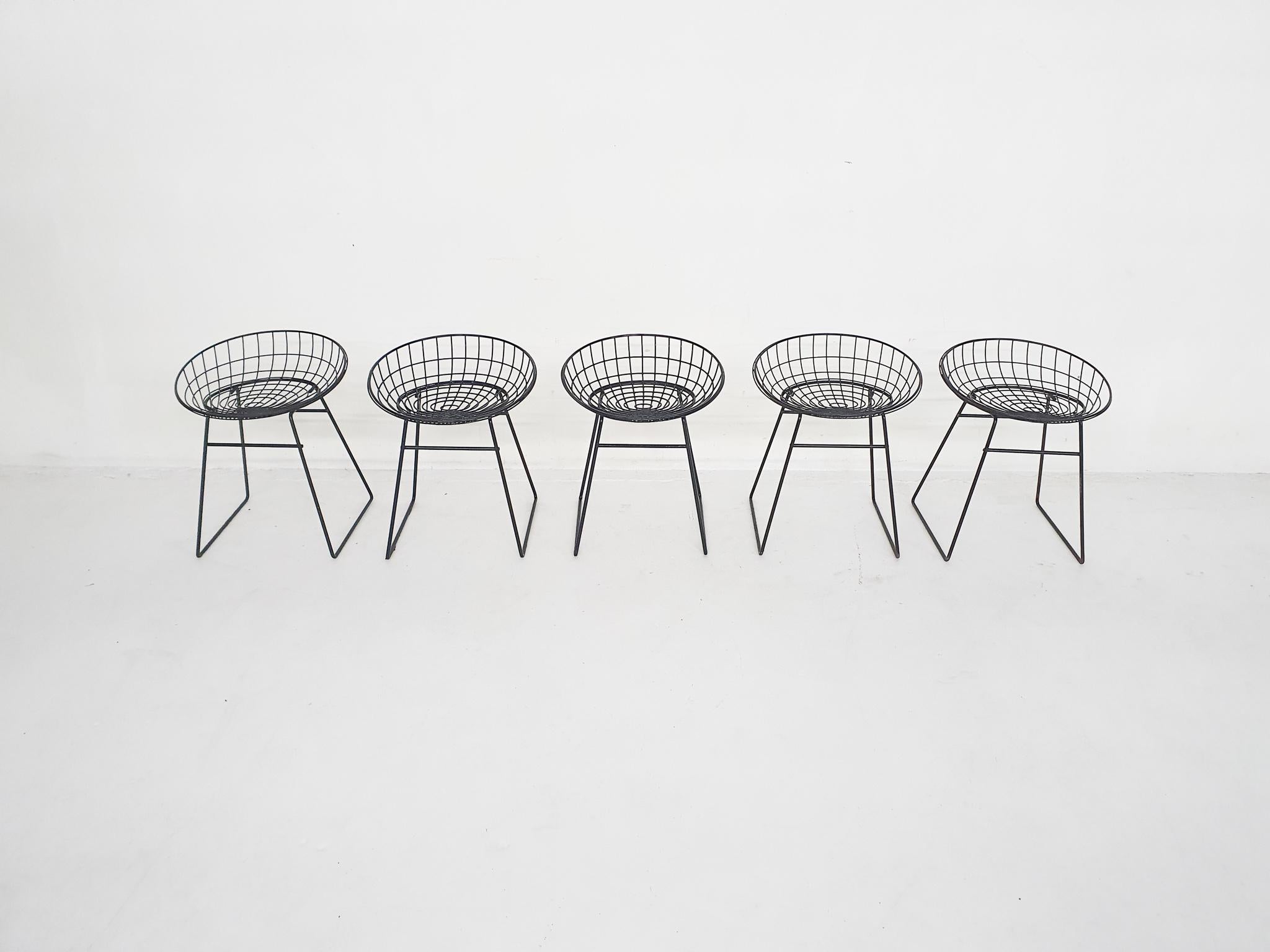 Black metal wire stools designed by Adriaan Dekker and Cees Braakman in 1958 for Pastoe.
Some of the frames were a bit rusted, and have been repainted in black.

Cees Braakman was a Dutch furniture designer who worked for UMS Pastoe in the