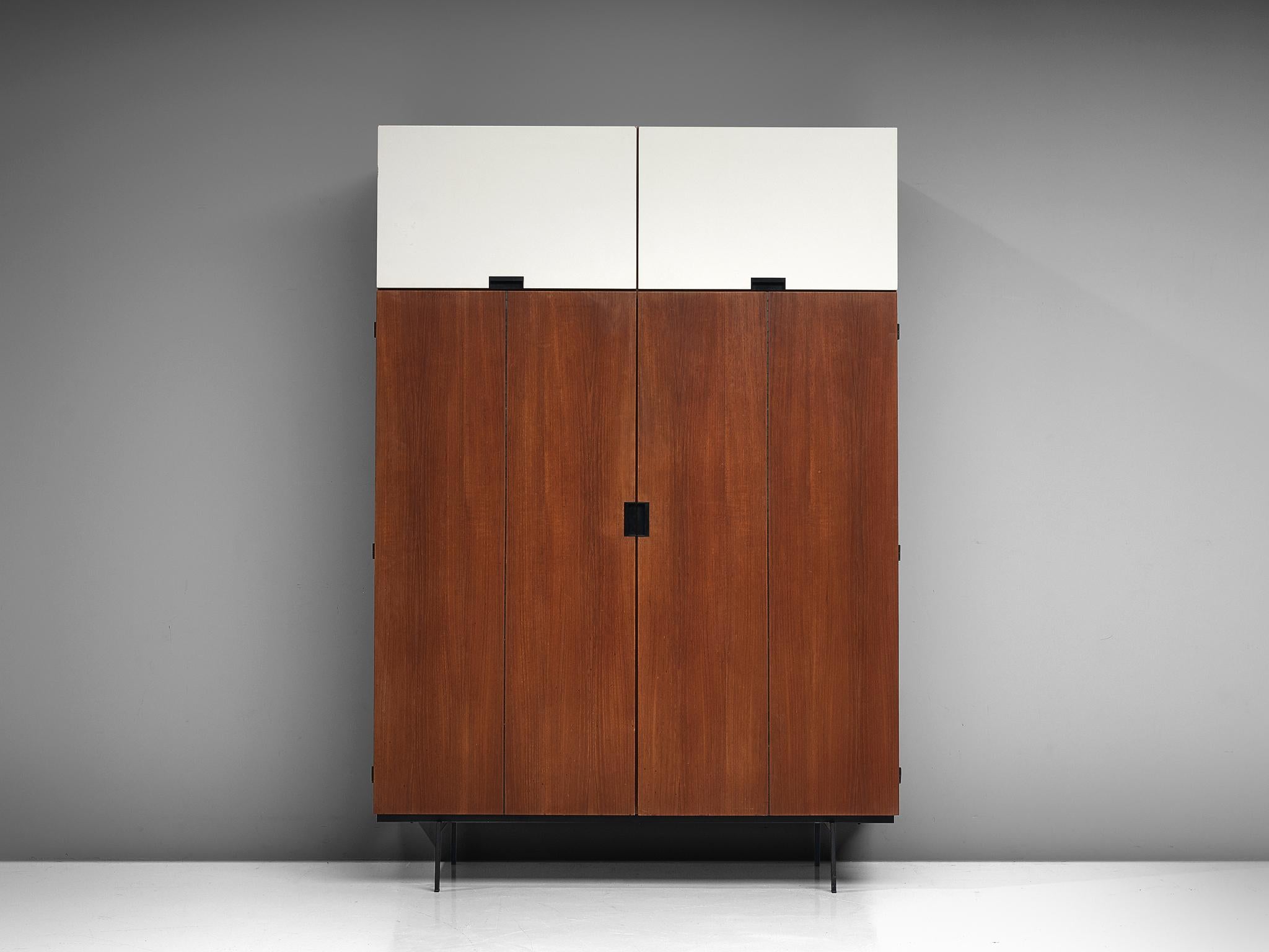 Cees Braakman for UMS Pastoe, teak and metal, Netherlands, design 1958, production 1960s. 

This highboard is designed by Cees Braakman, and is from his Japanese Series for Pastoe.
