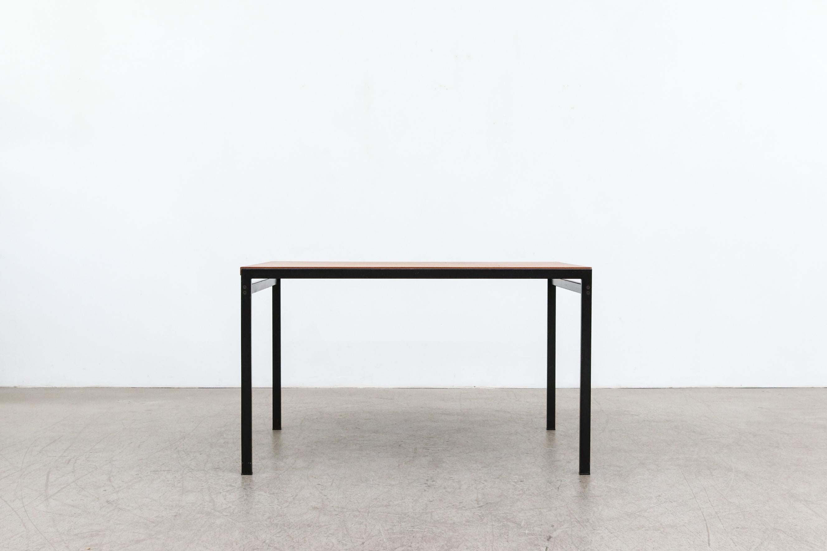 1960's Cees Braakman Japanese Series Dining Table for Pastoe. Lightly refinished teak top with black enameled metal legs. In original condition with visible wear. This version does not have a leaf. Wear is consistent with it's age and use.
