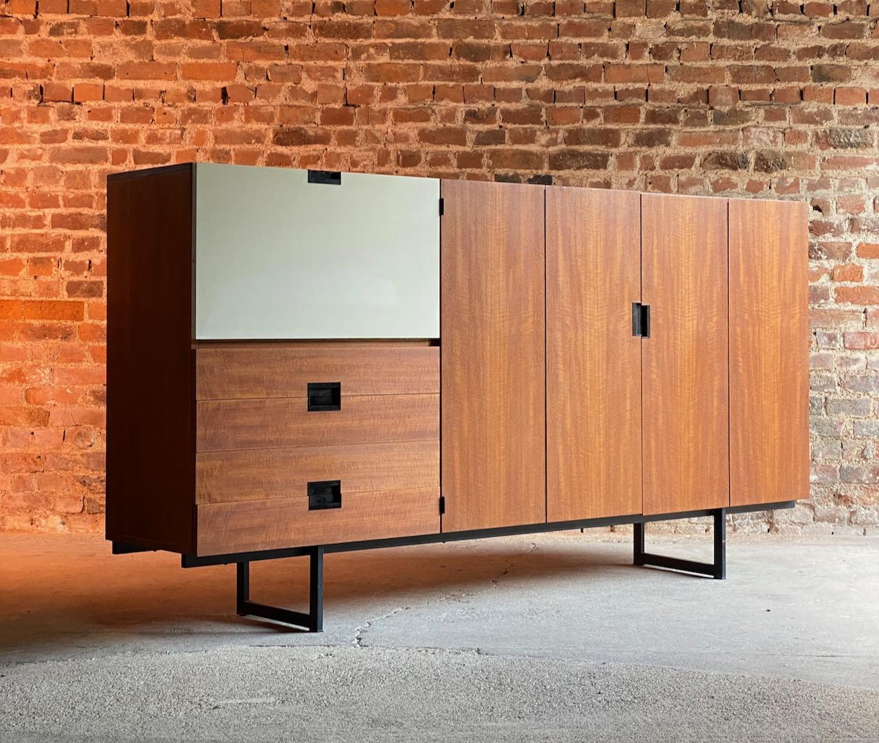 Cees Braakman Japanese Series high board for Pastoe Netherlands 1958

Cees Braakman Japanese series high board by UMS Pastoe, Netherlands circa 1958 the teak body having one white laminate fall front door over four pullout / pull-out drawers with
