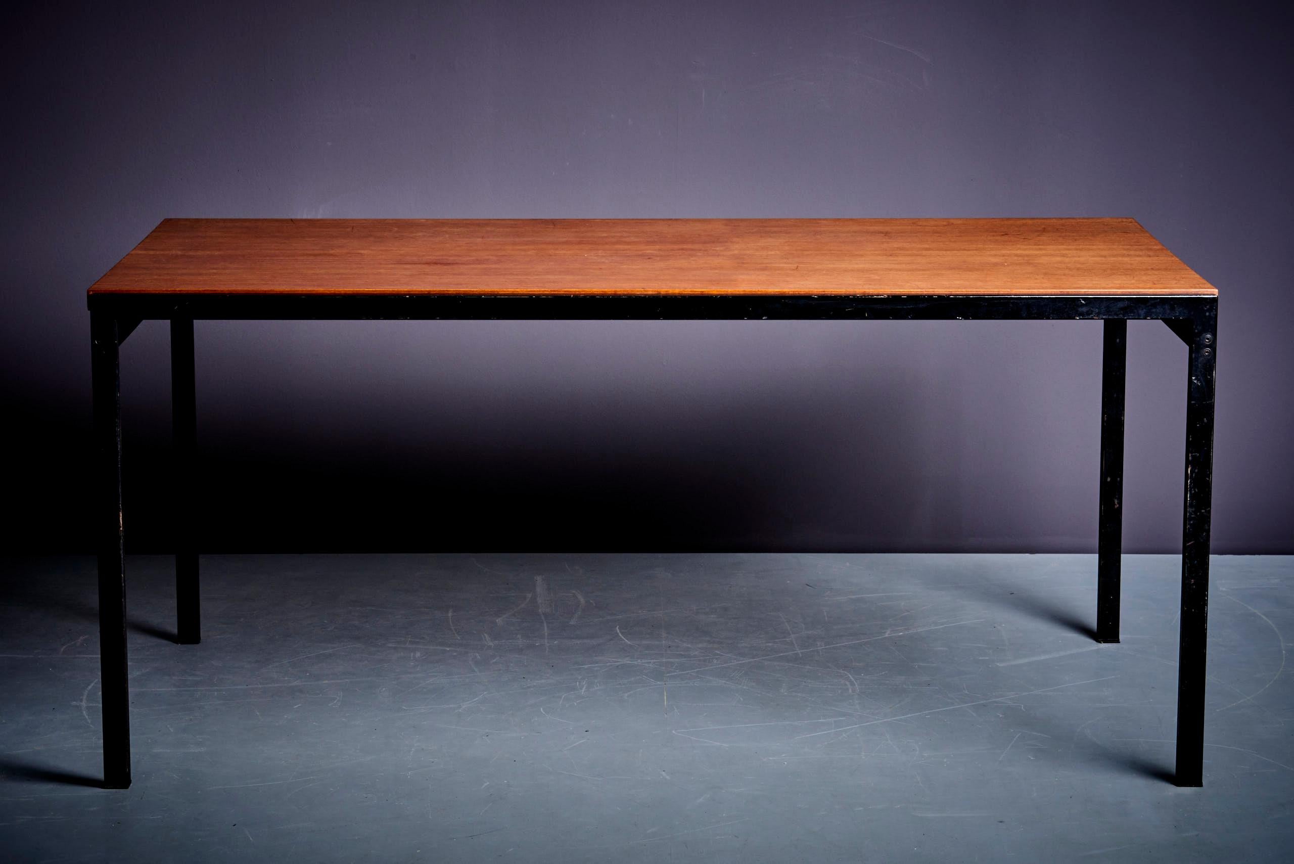 This vintage mid-century TU30 minimalist dining table, designed by Cees Braakman for Pastoe in the 1960s, features a beautiful teak top. This iconic piece embodies the clean lines and functional elegance typical of mid-century modern design, making