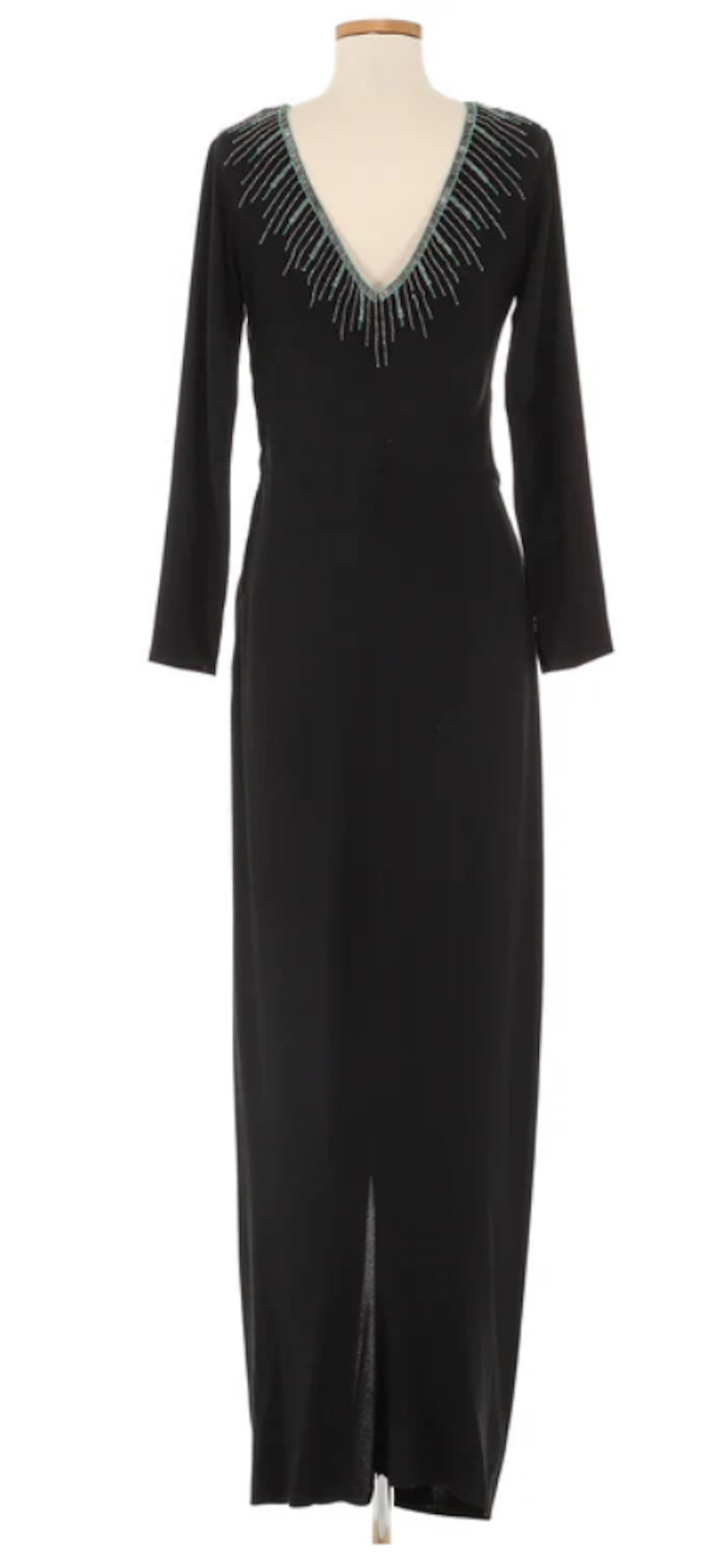 VINTAGE GRACE NY

Ceil Chapman Vestido negro de manga larga adornado c. Años 40-1950. Ceil Chapman, conocida por ser la diseñadora de moda de Marilyn Monroe, alcanzó la fama en los años 40 y 50 por crear trajes de noche glamurosos y accesibles. El