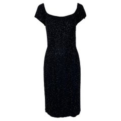 Ceil Chapman Vestido de fiesta negro con muchas cuentas, años 60