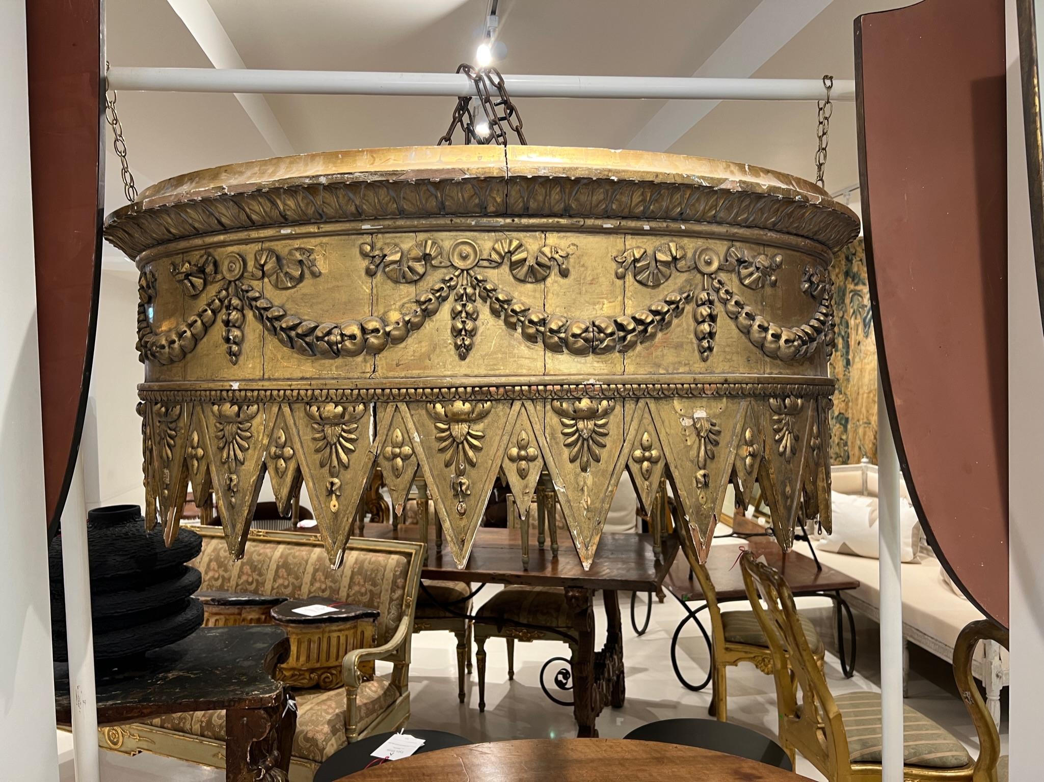 Also known as a baldacchino, baldaquin, or baldachin. Very large 18th Century architectural piece that would have been suspended from the ceiling over an altar but would be a stunning canopy over a bed.  There are hooks on the sides for curtains. 