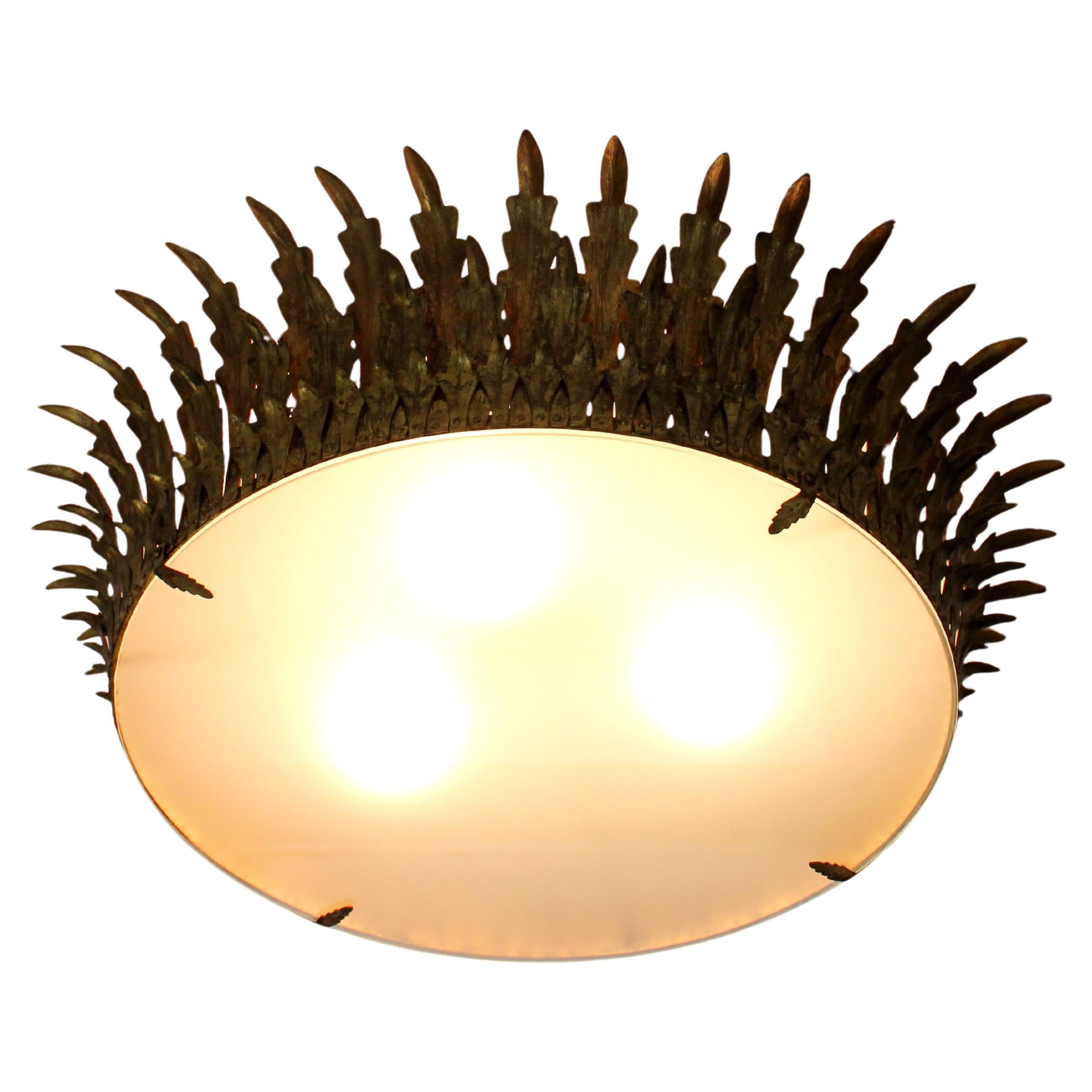 Ceiling and wall lamp with a gold-plated metal frame in a crown design