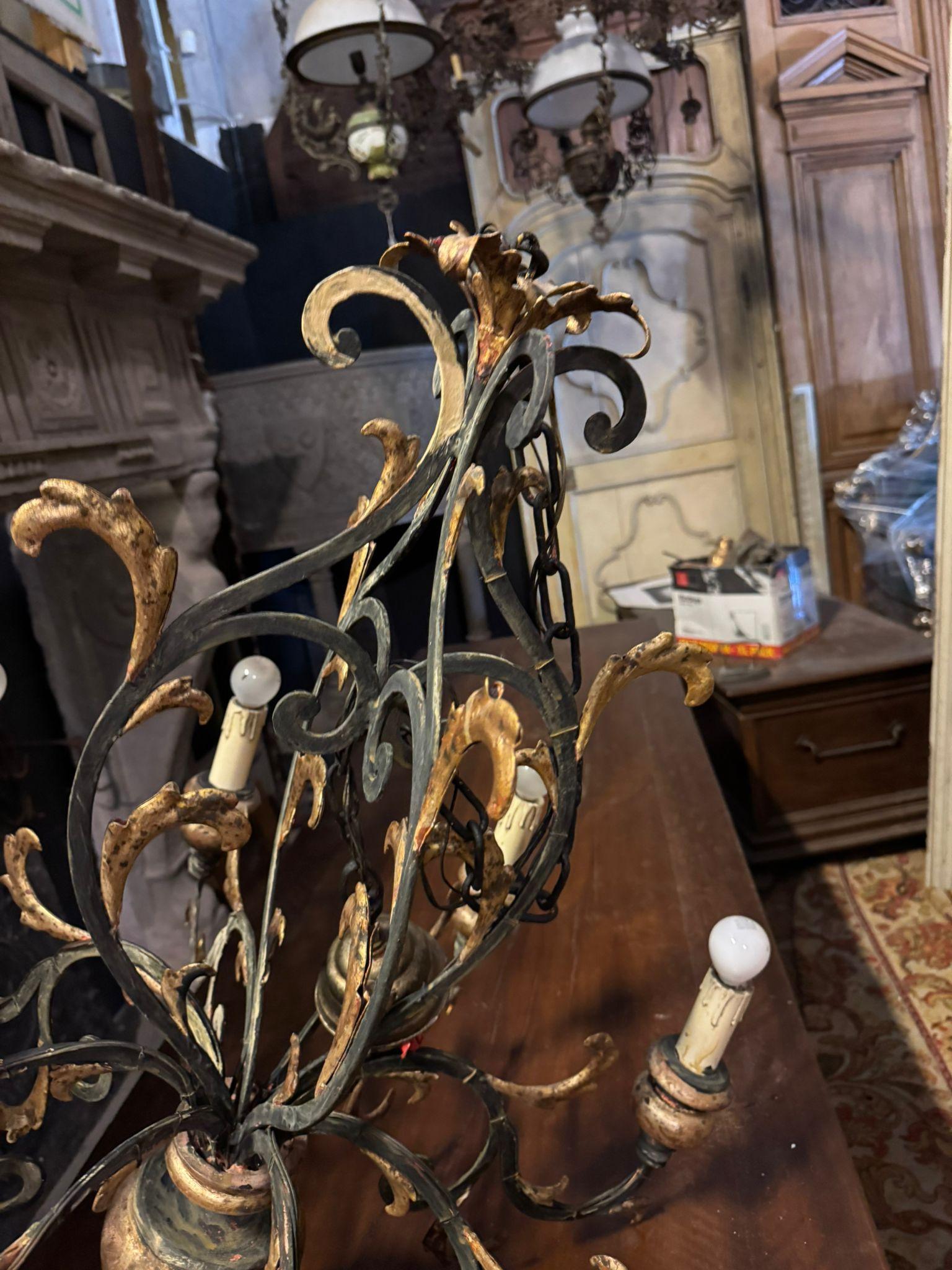 Carved Ceiling chandelier in sheet metal and gilded wood, Italy For Sale